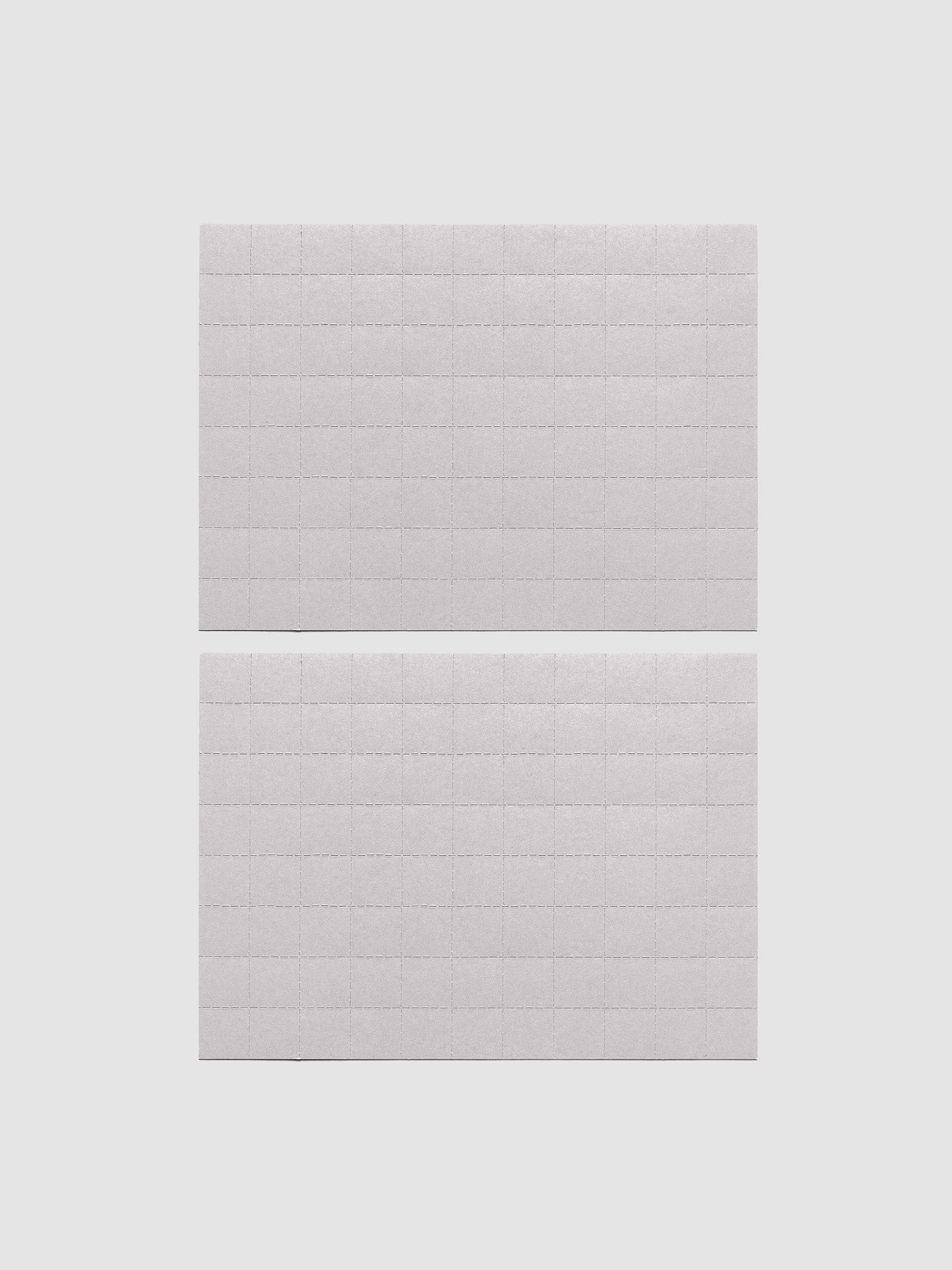 Two sheets of grey tear-off stickers