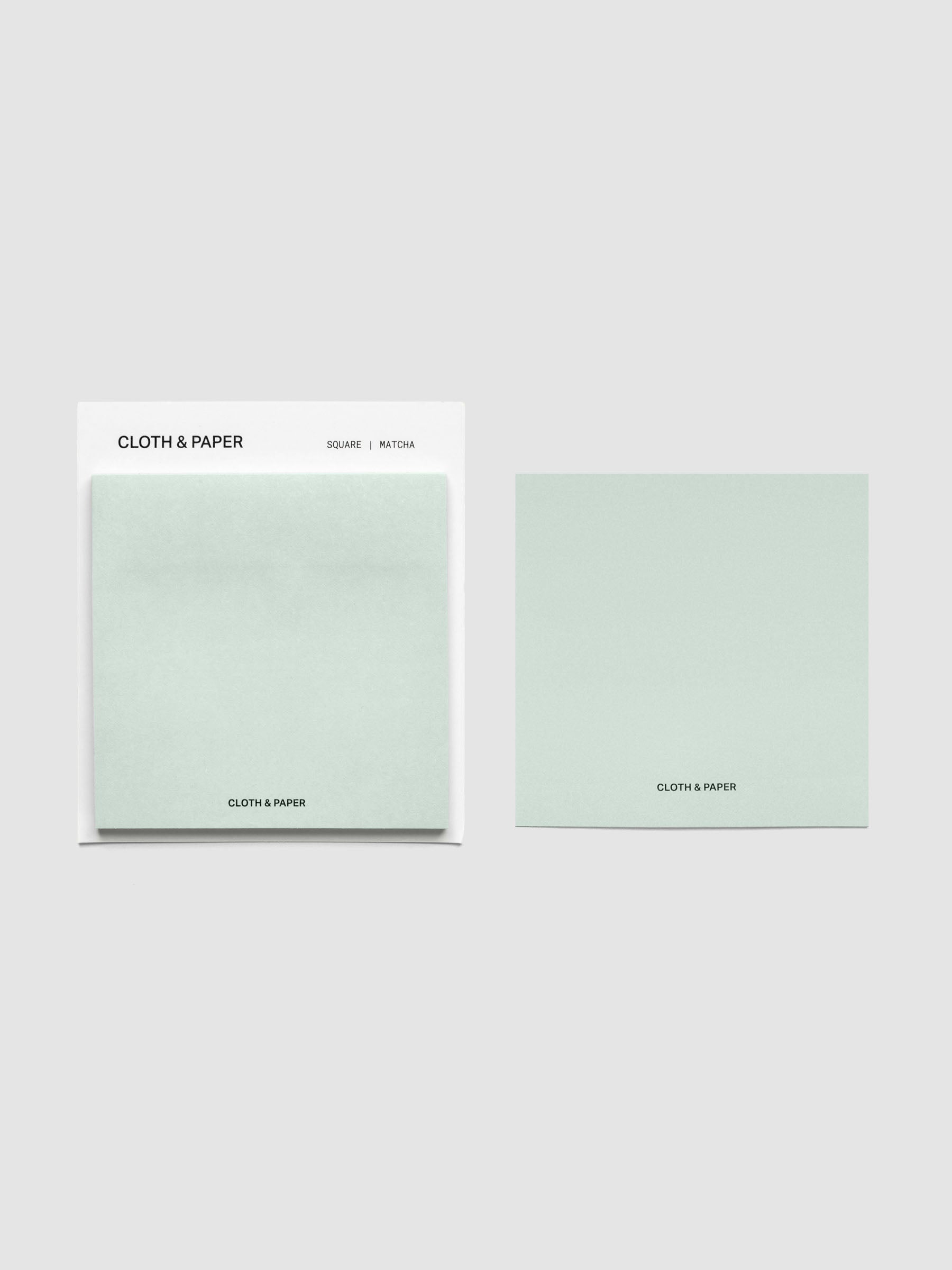 Square Matte Sticky Notes in light sage green shown with backing card and loose sheet