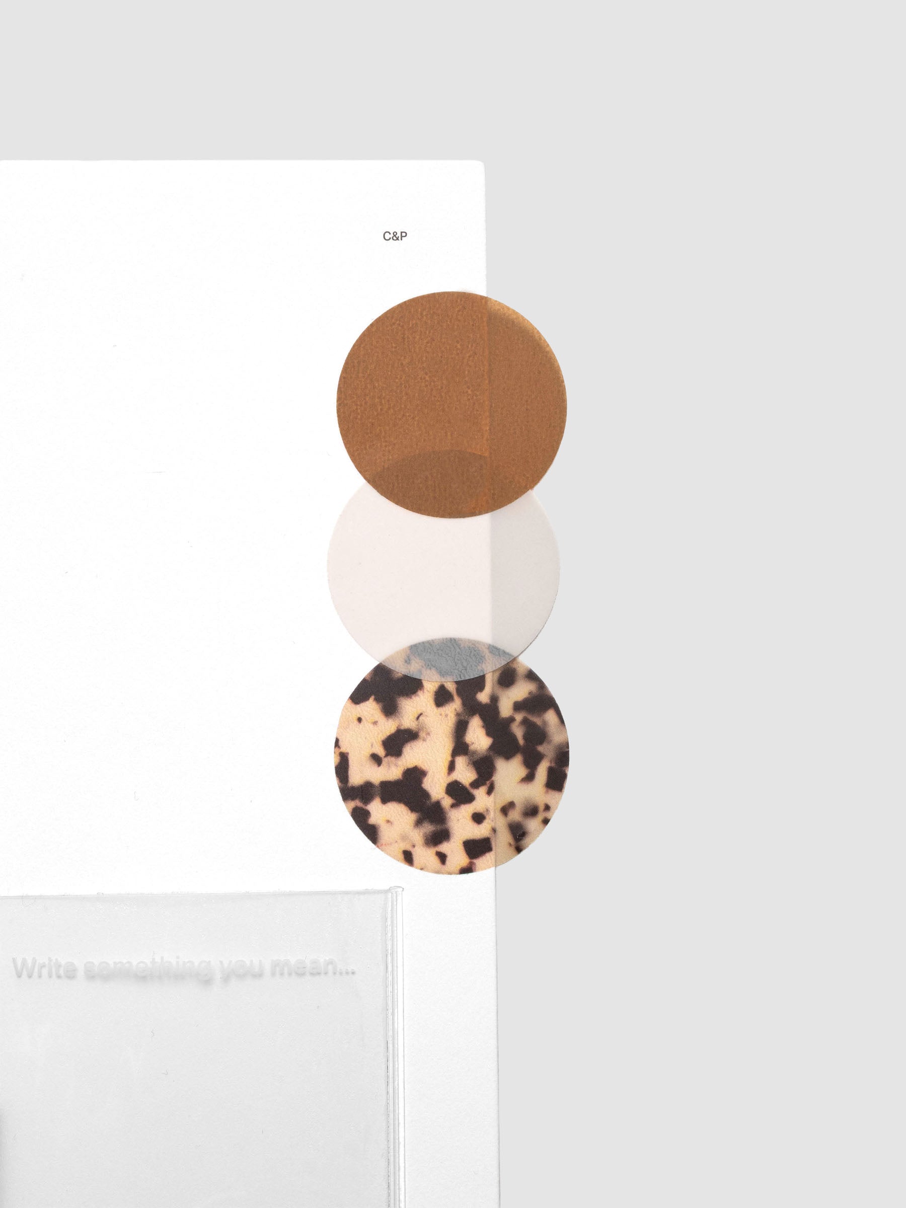 One of each Circle Page Flag Trio | Walnut, Desert Tortoiseshell, Ibiza shown on a planner dashboard.
