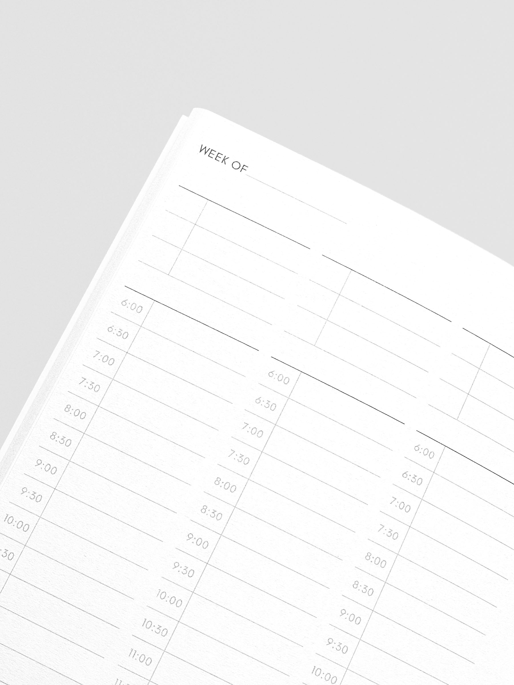 Travel Notebook in size A5 Slim in color Bordeux with 30 Minute Time Block pages with inner pages shown in close up.