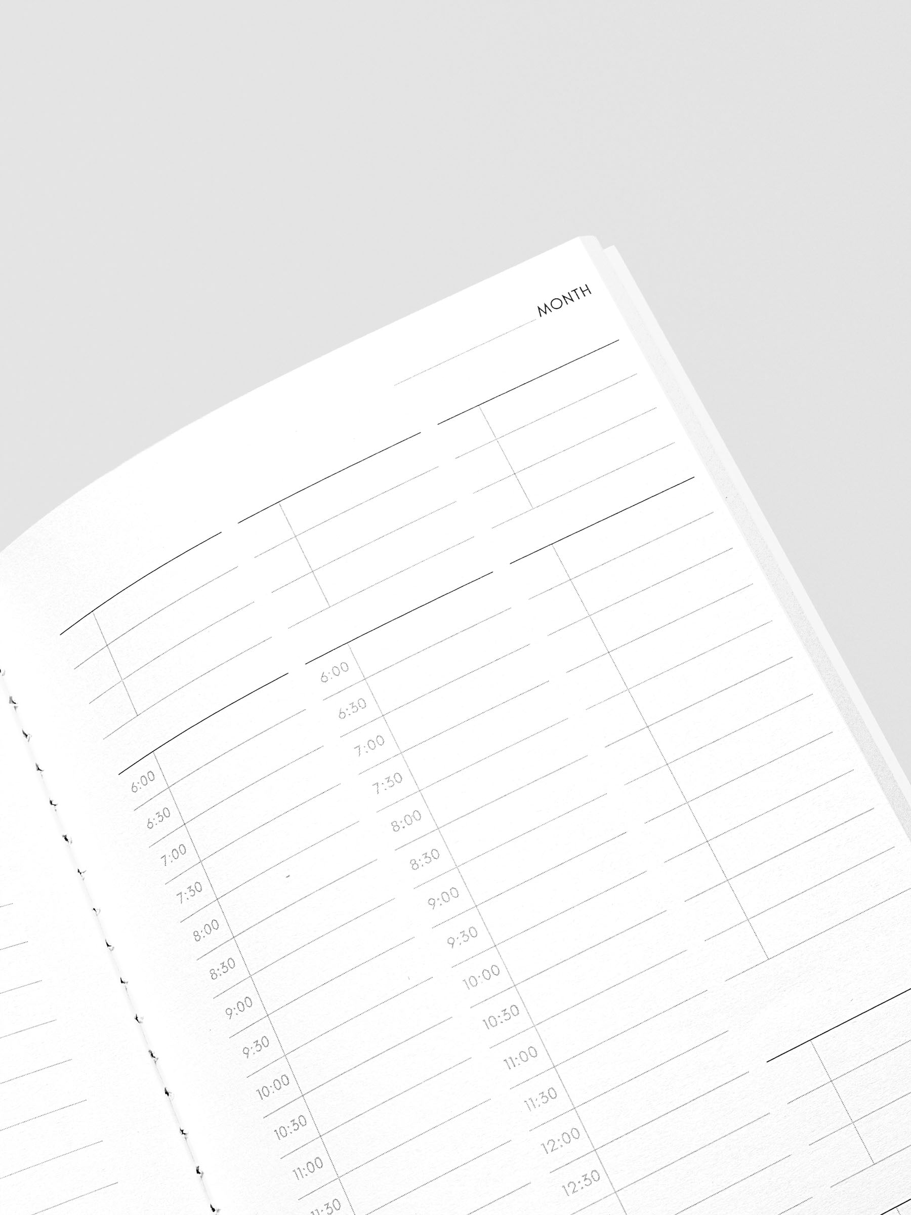 Travel Notebook in size A5 Slim in color Bordeux with 30 Minute Time Block pages with inner pages shown in close up.