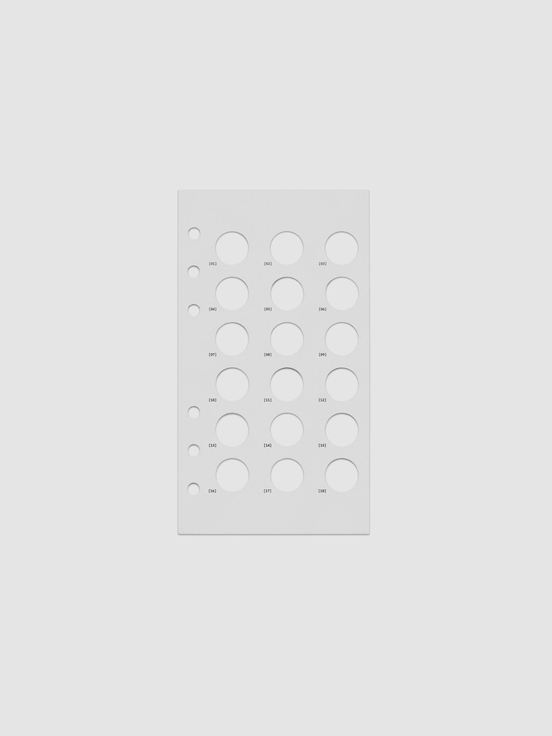 One transparent dashboard with 18 circular cut outs. One piece from the Inner Blueprint Dashboard Duo shown in size Personal.