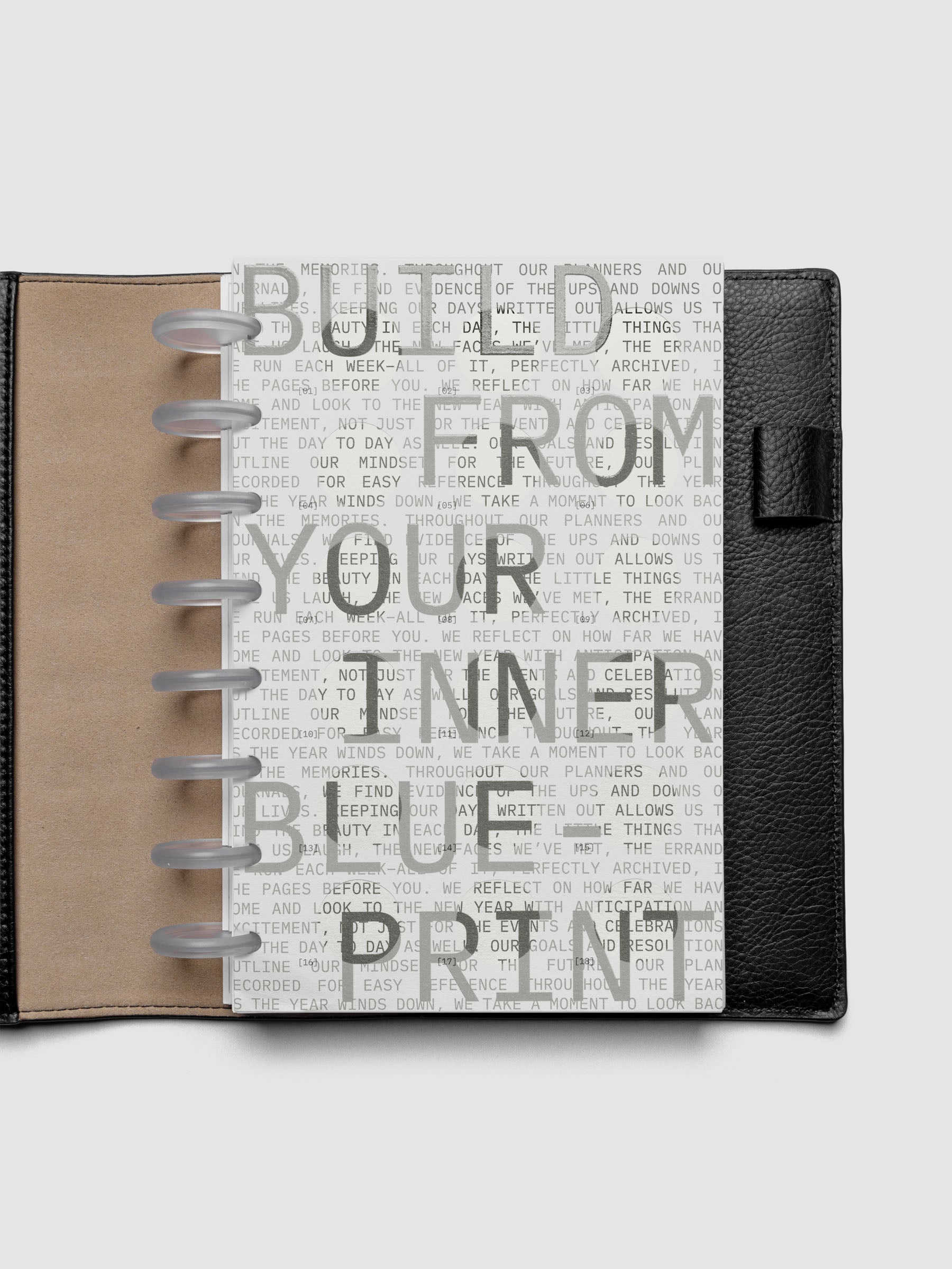 Inner Blueprint Dashboard Duo shown ring bound in a black leather folio in size Half Letter.