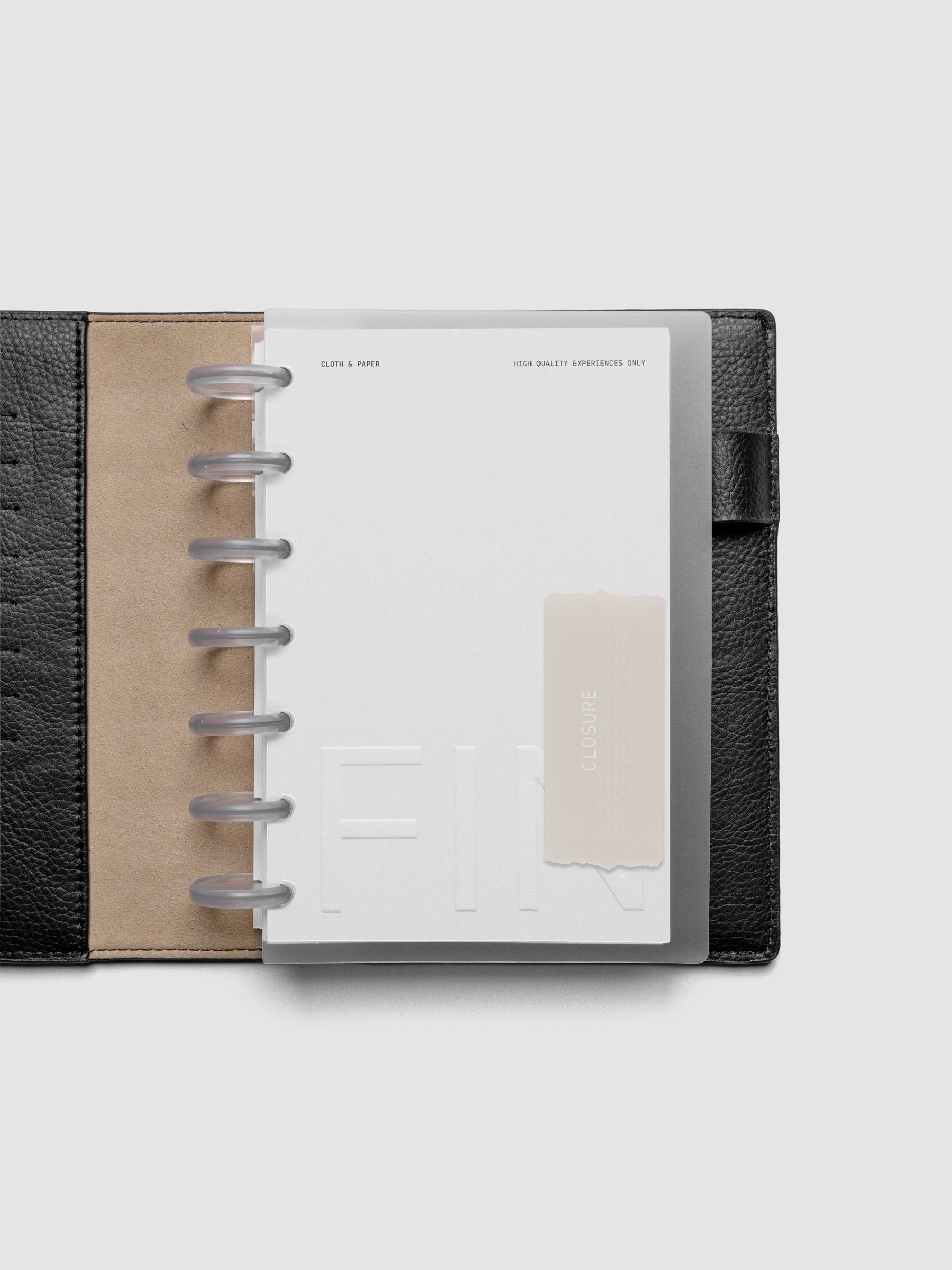 Closure Planner Dashboard + Cover Set in size HP Mini shown discbound in a black leather folio cover.