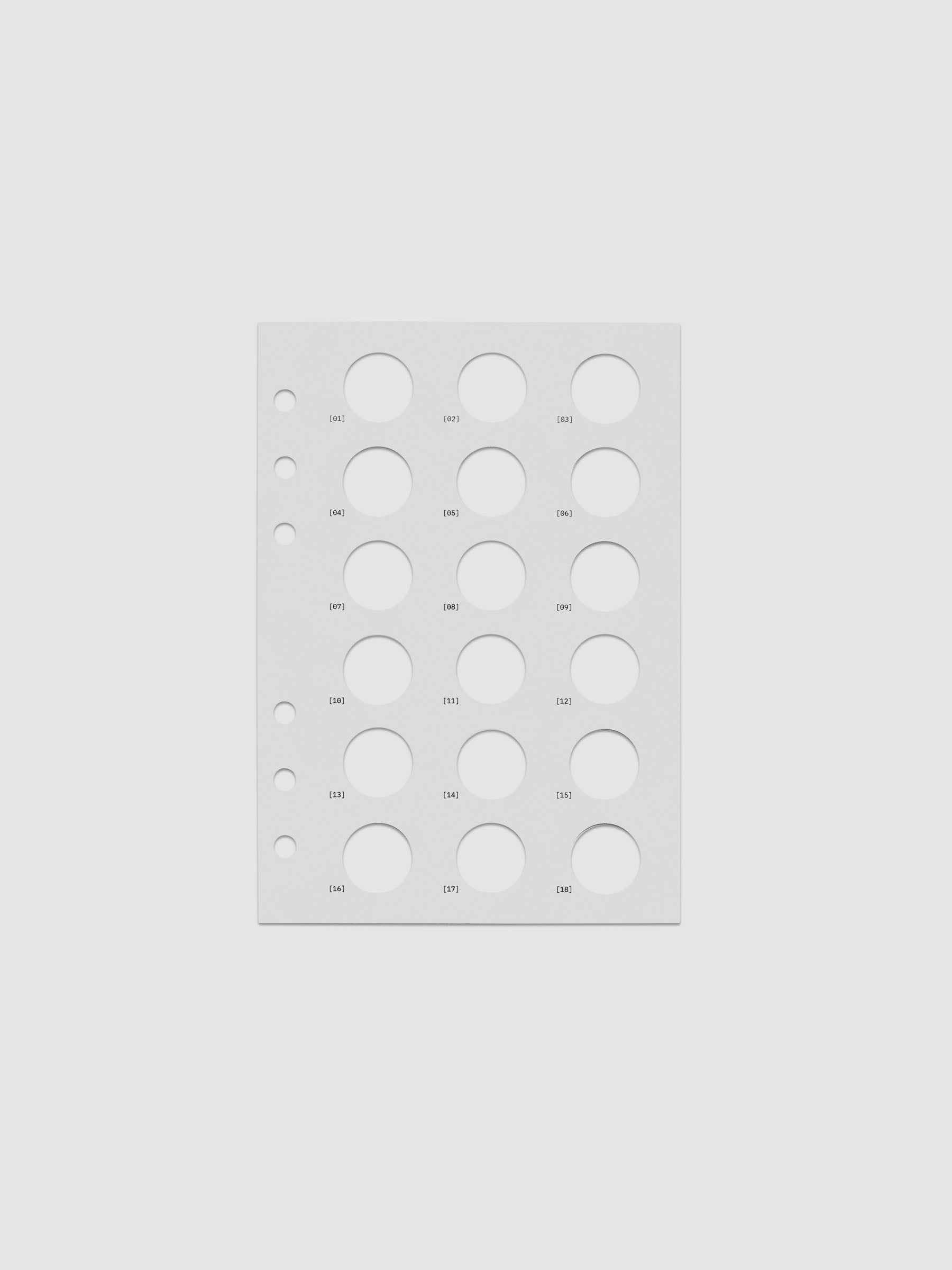 One transparent dashboard with 18 circular cut outs. One piece from the Inner Blueprint Dashboard Duo shown in size Personal Wide.