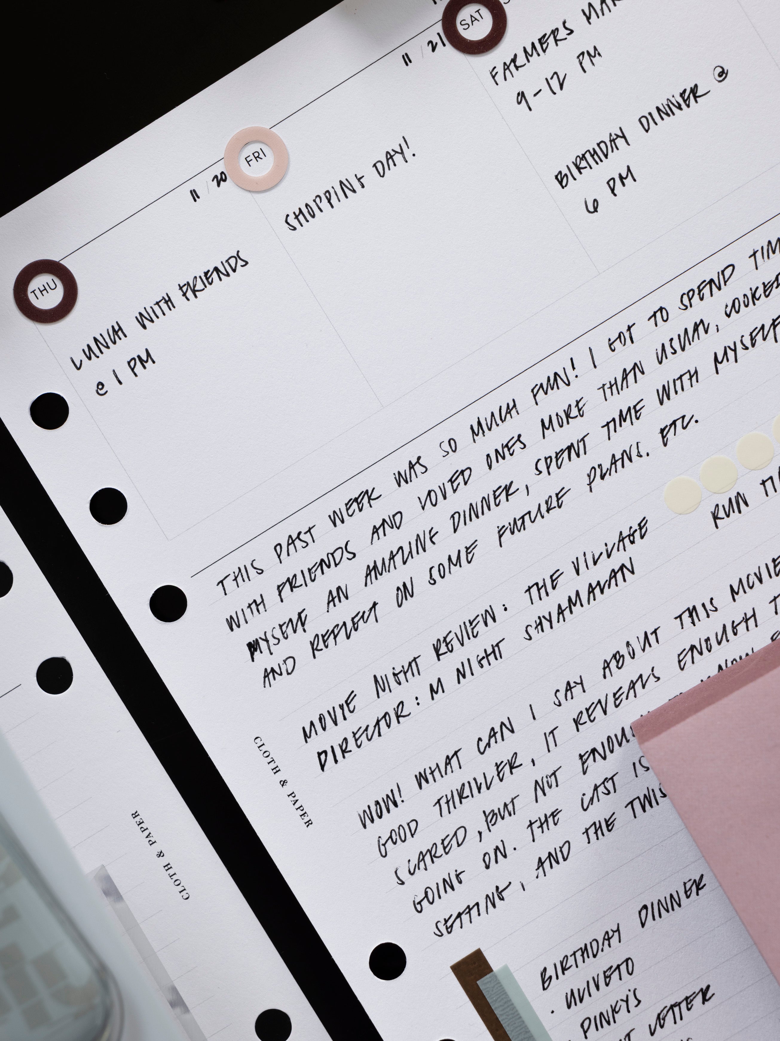 A filled in planner insert with Spotlight Stickers | High Gloss applied to the days of the week for emphasis.