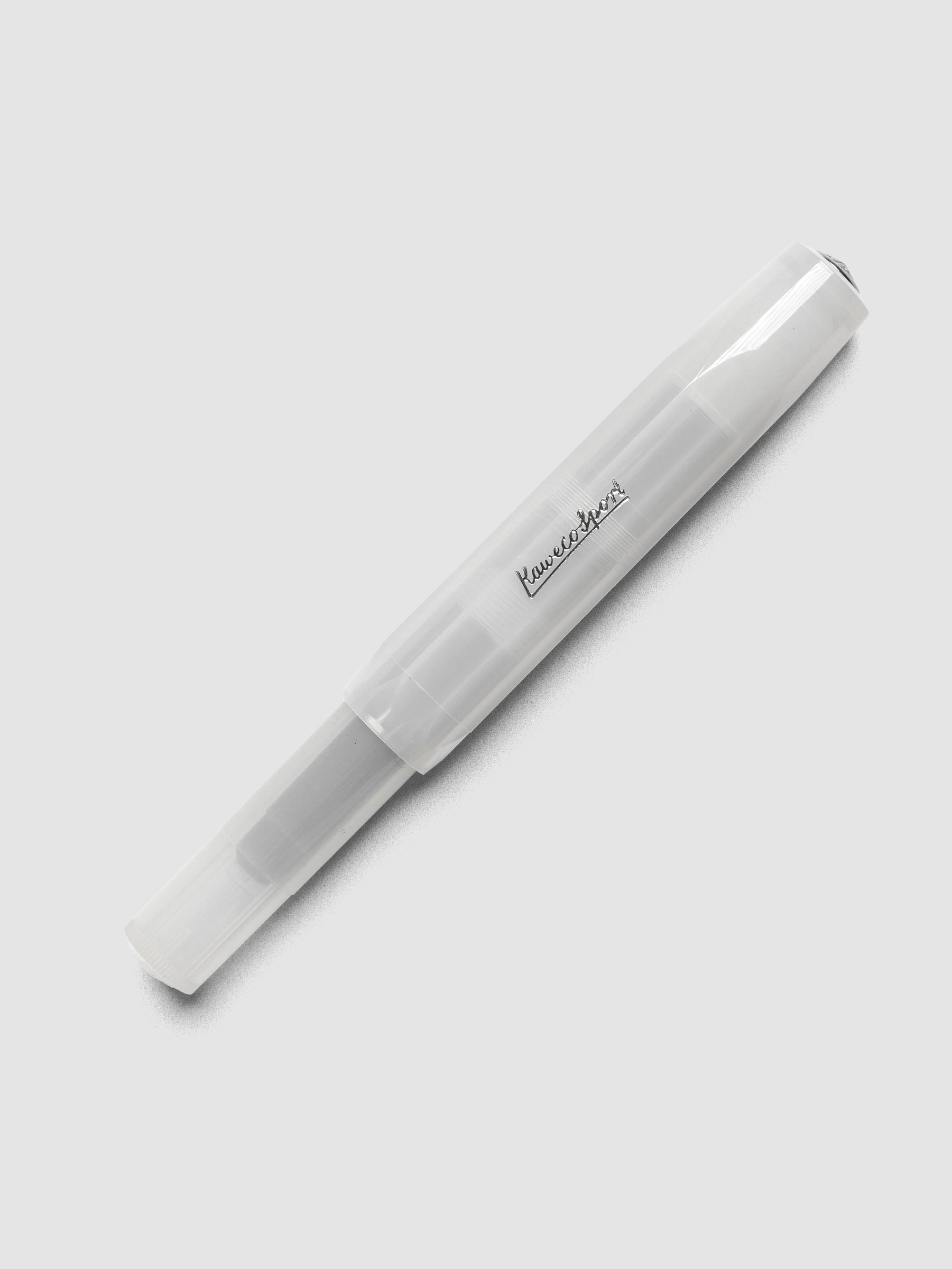 Clear fountain pen shown capped.