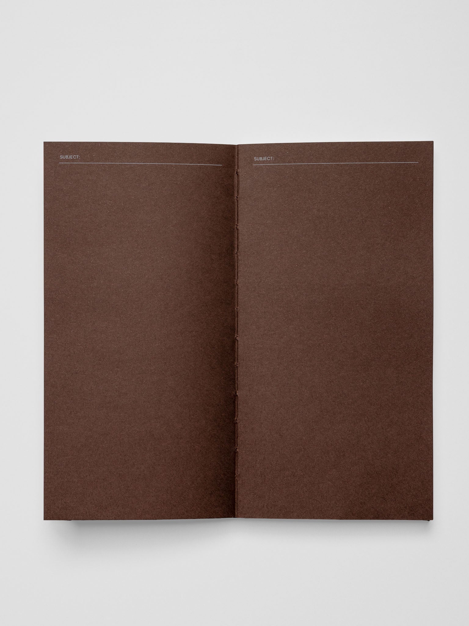Common Thread Notebook showing the brown interior pages.