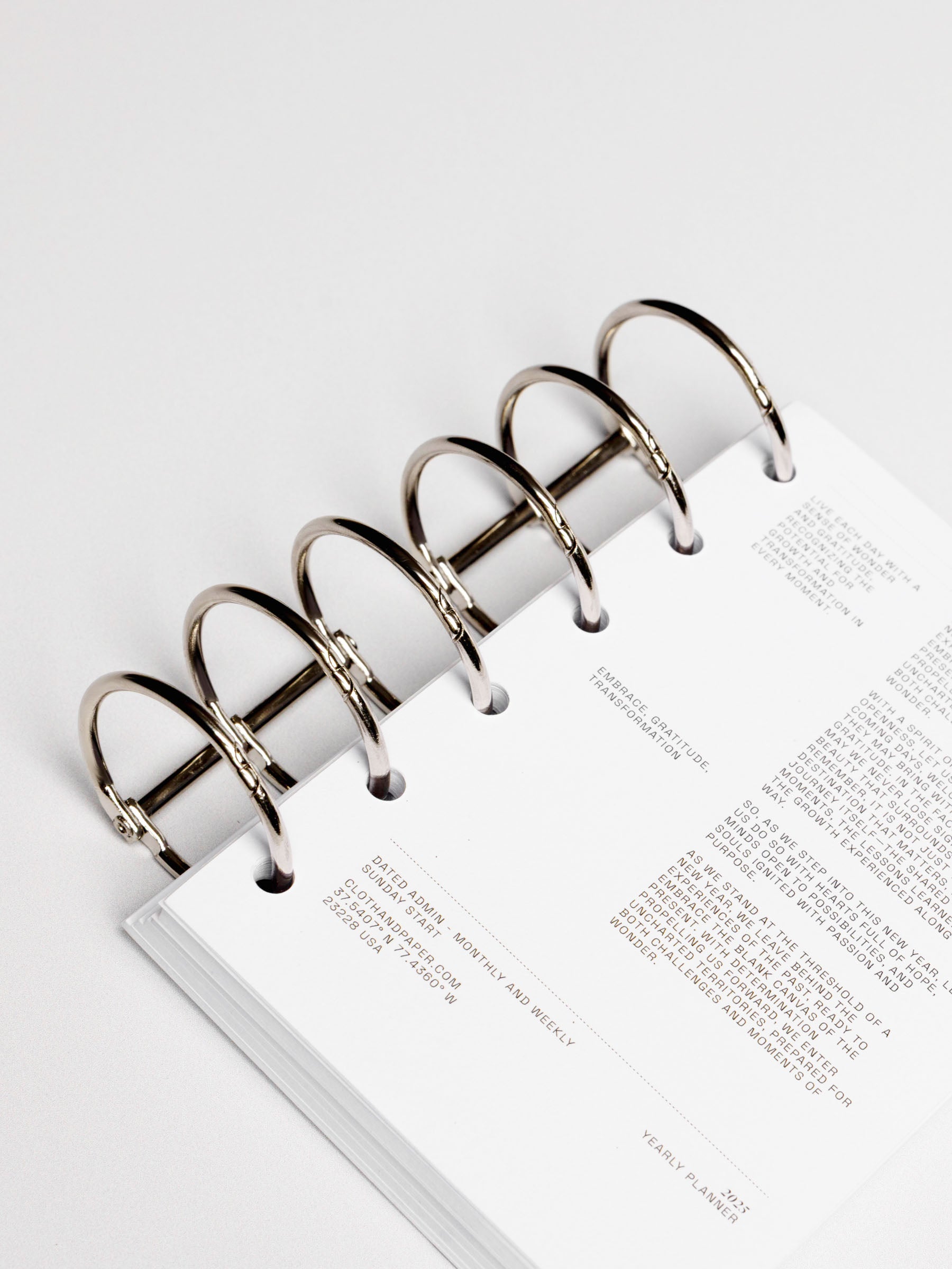 Planner rings displayed in a planner system on a neutral background. Color shown is silver.