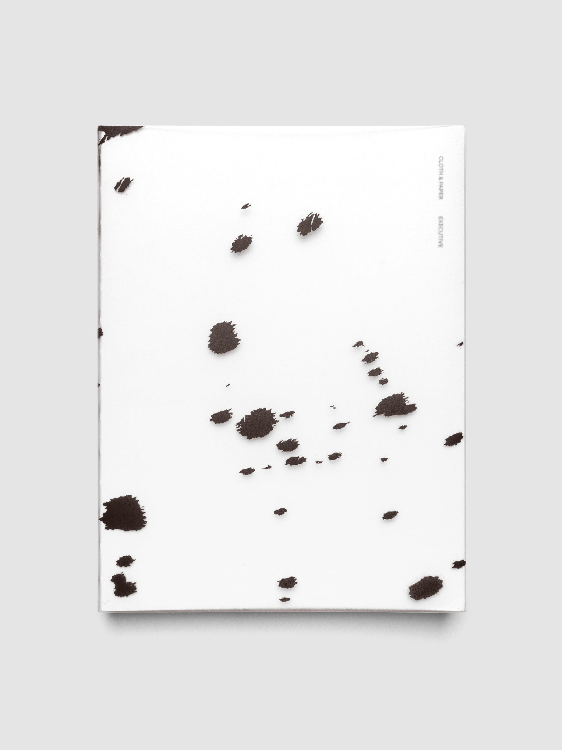 HP Classic frosted plastic notebook cover with brown dalmatian animal print pattern on a Perfect Bound Notebook