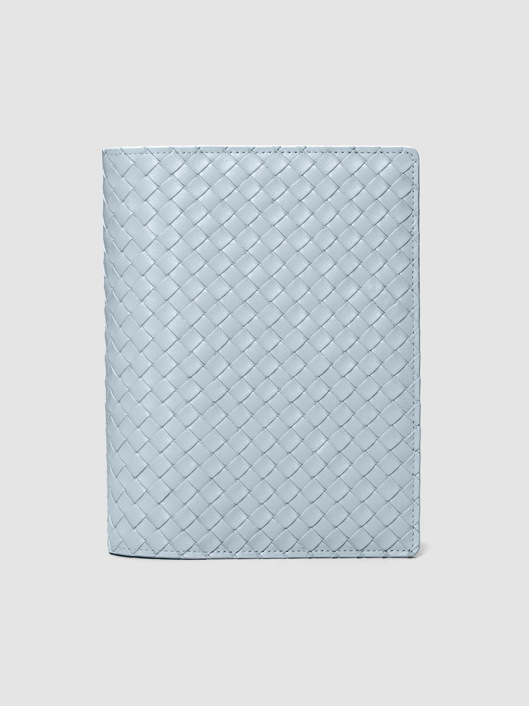Blue genuine leather woven leather folio sized for Half Letter and A5 planners.