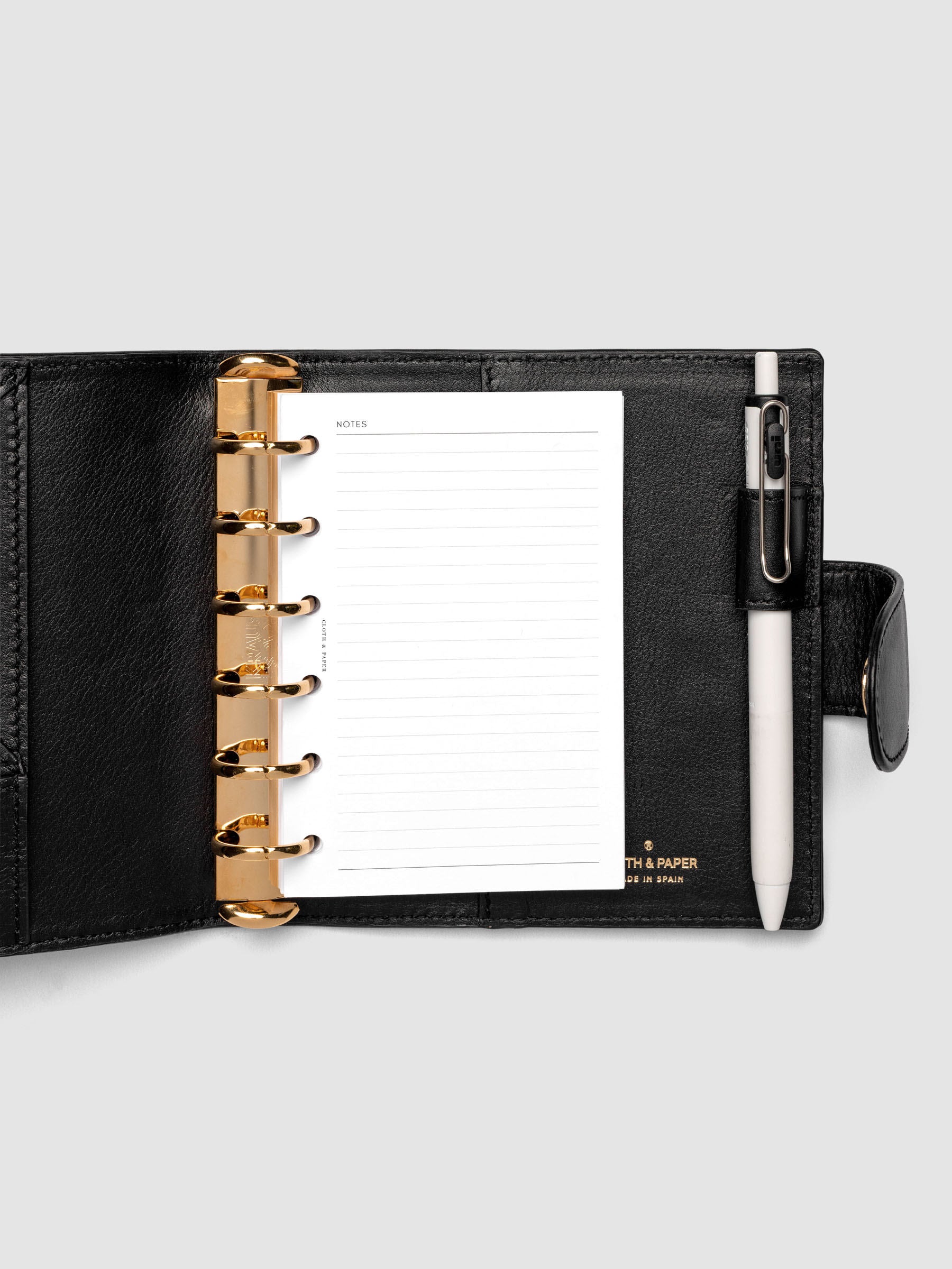 Heirloom Ring Cover Genuine Leather Pocket 6-Ring Punch in black, planner cover open with pages inside