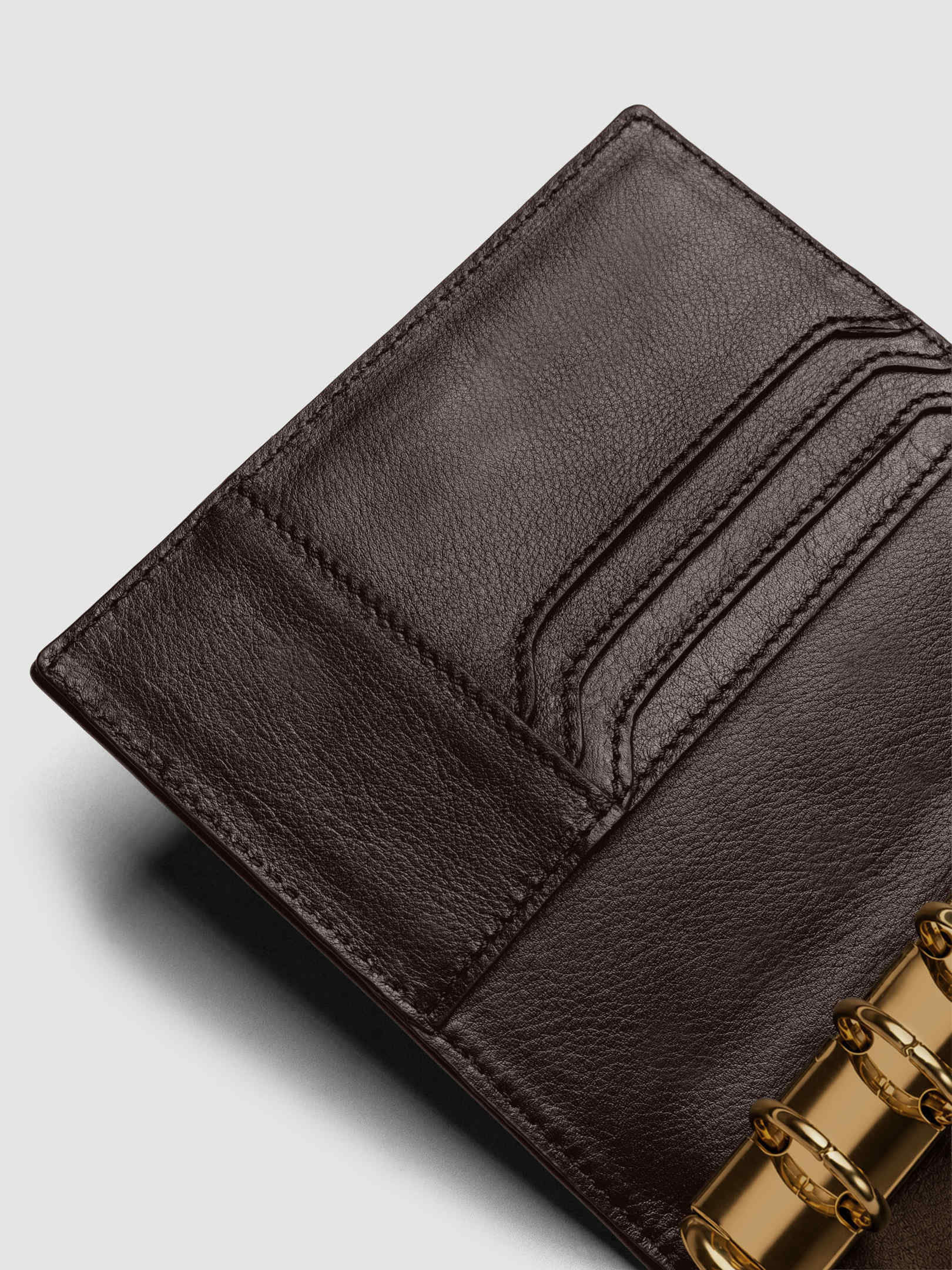 Heirloom Ring Cover Genuine Leather Pocket 6-Ring Punch in dark brown, detail view of credit card pockets