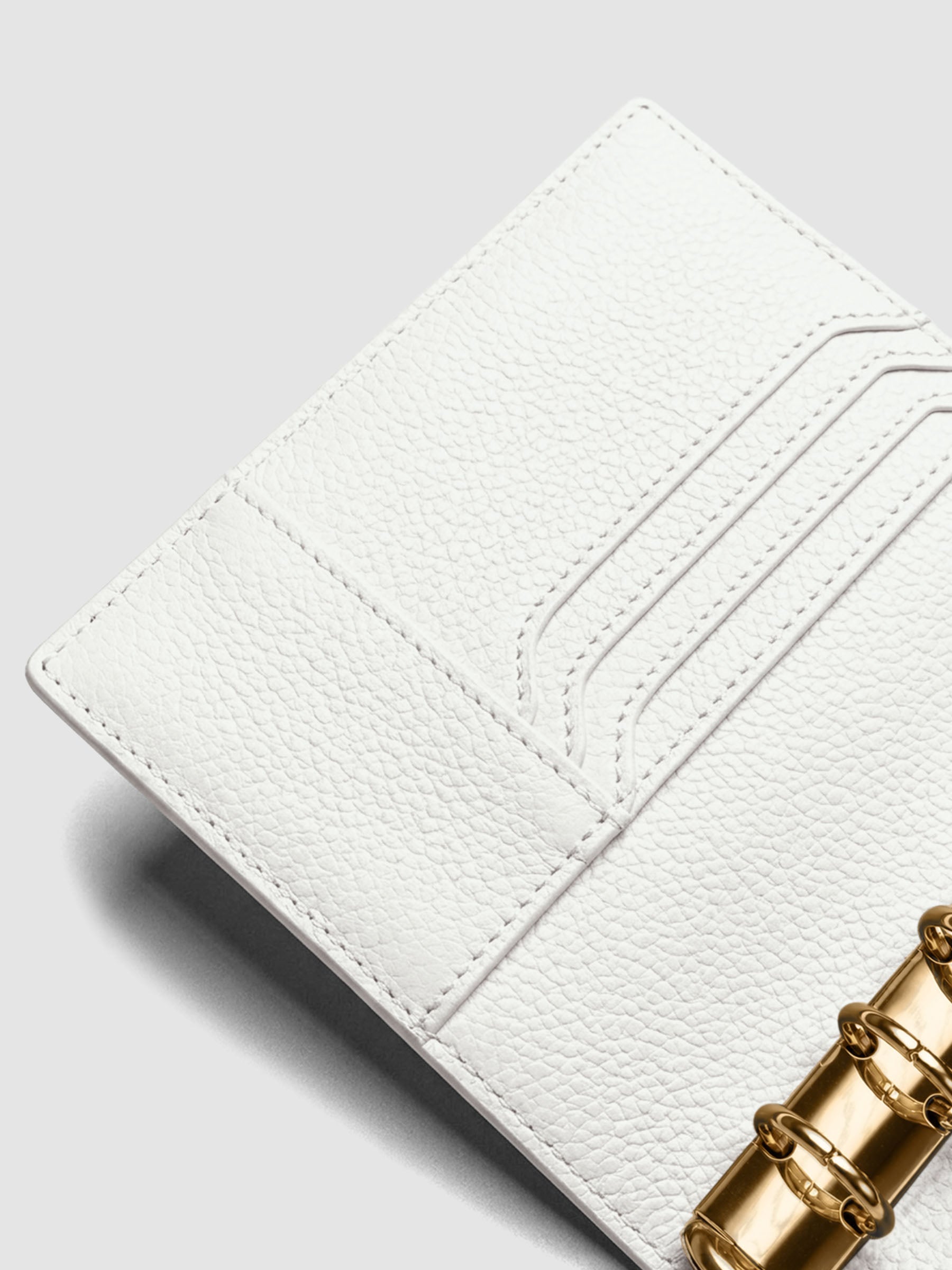Heirloom Ring Cover Genuine Leather Pocket 6-Ring Punch in off-white, detail view of credit card pockets