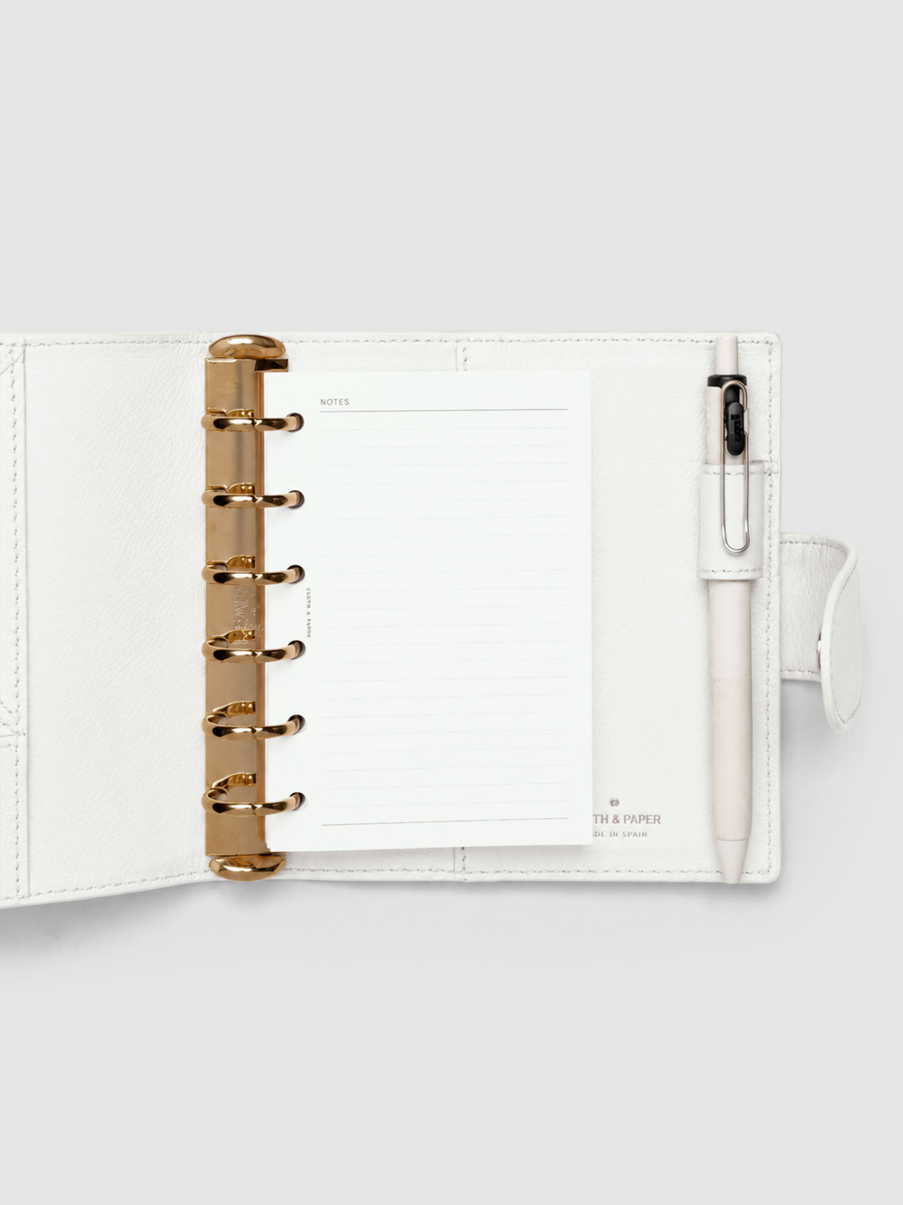 Heirloom Ring Cover Genuine Leather Pocket 6-Ring Punch in off-white, planner cover open with pages inside