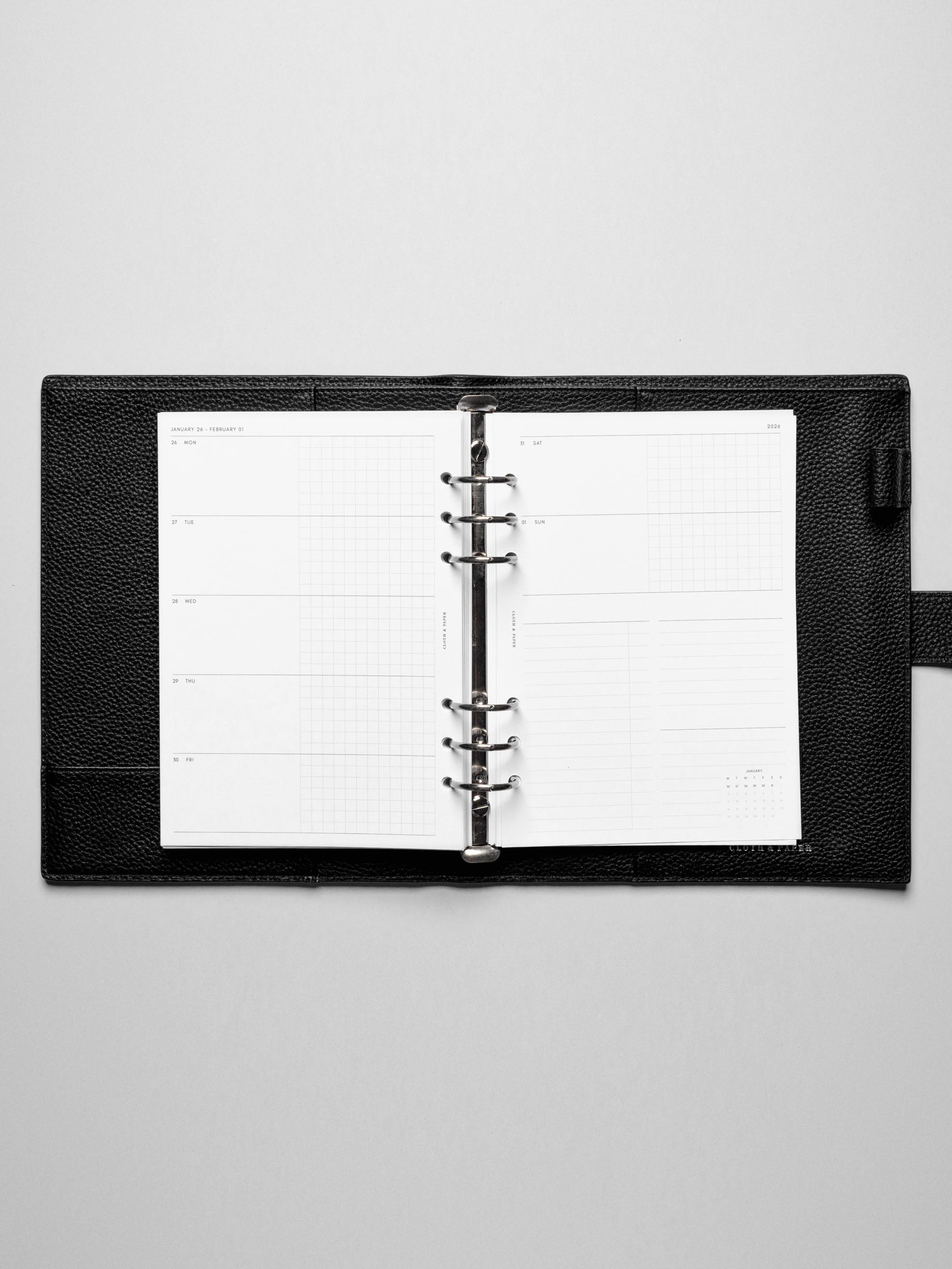 Inserts in use inside a leather planner.