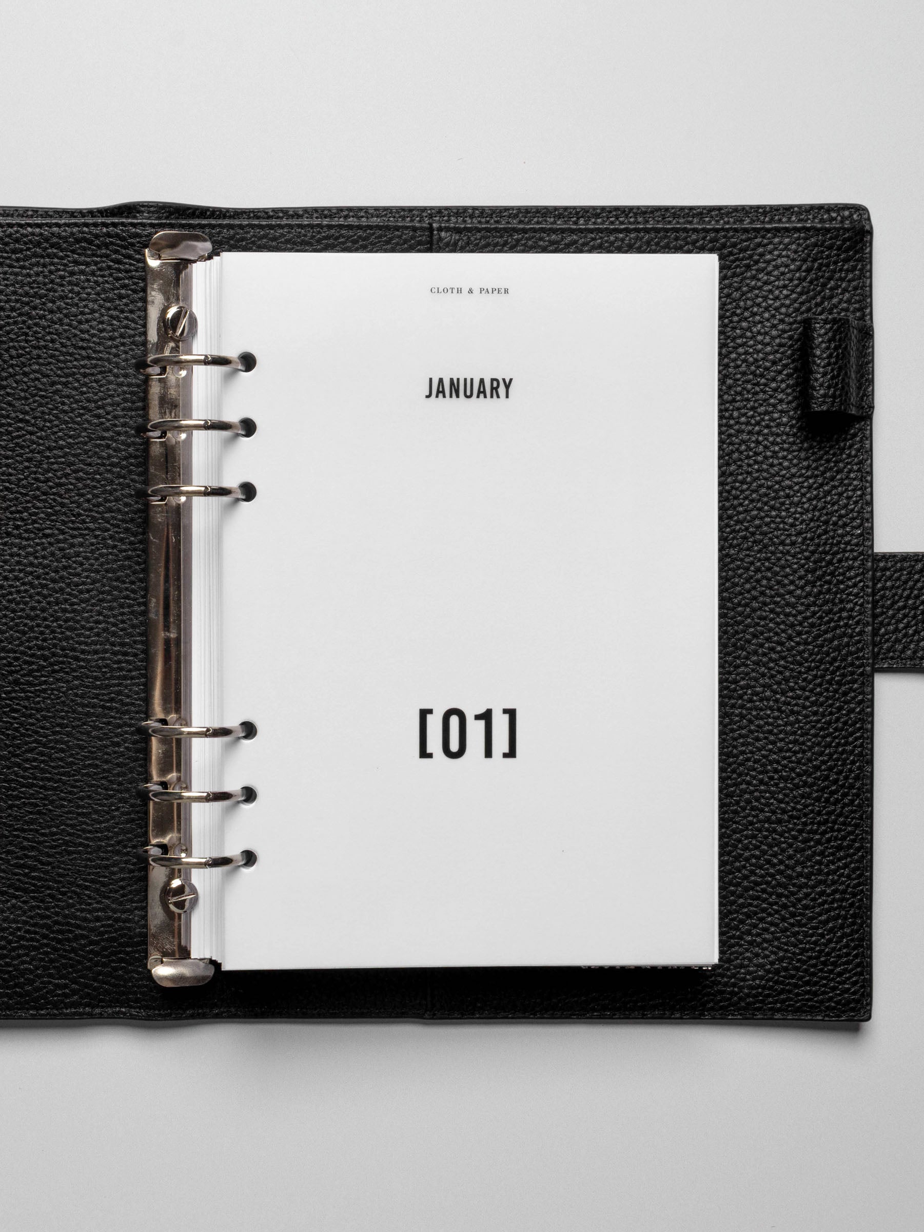 Dashboard in use inside a leather planner.