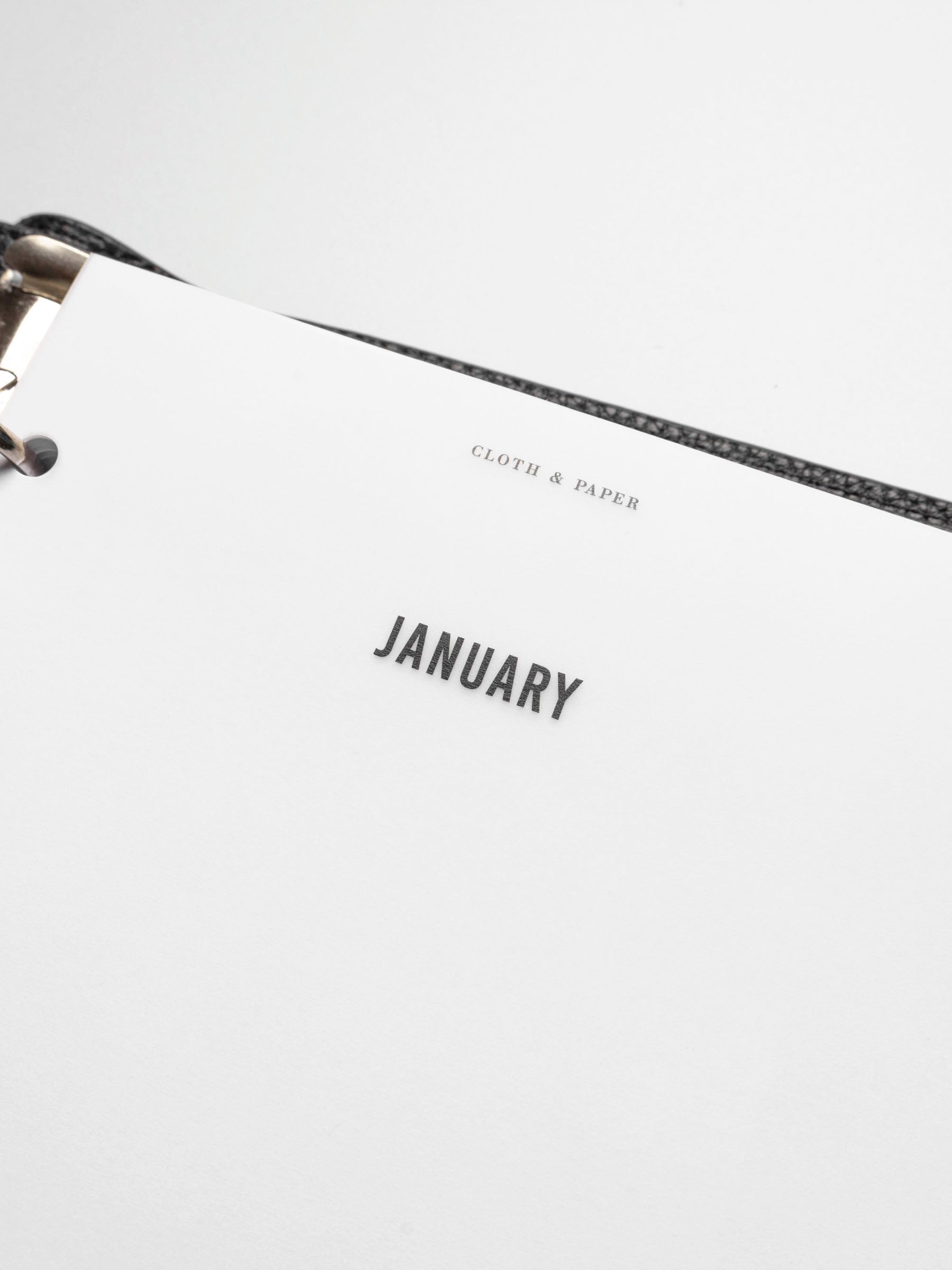 Closeup of dashboard in use inside a leather planner.