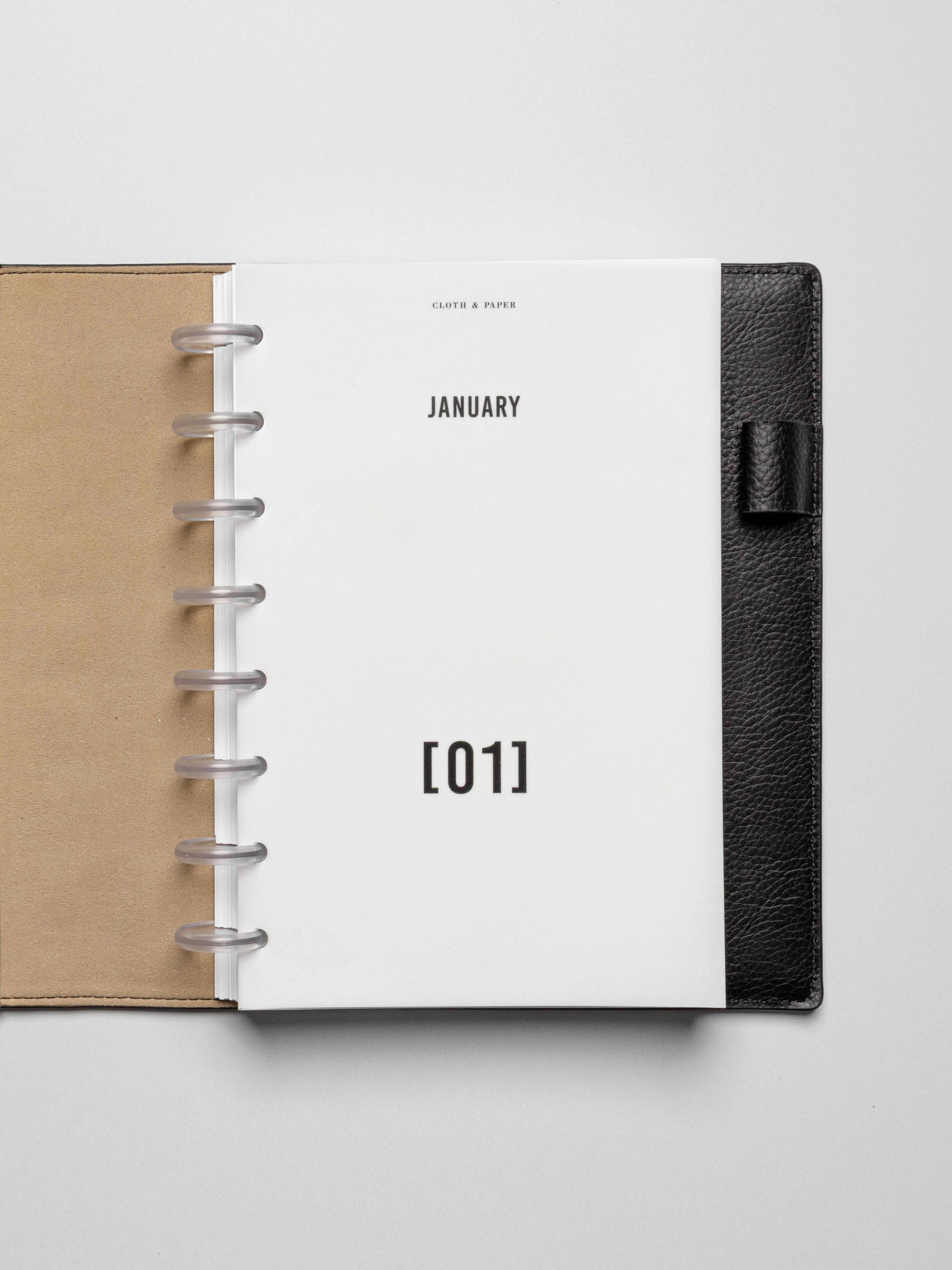 Dashboard in use inside a leather planner.