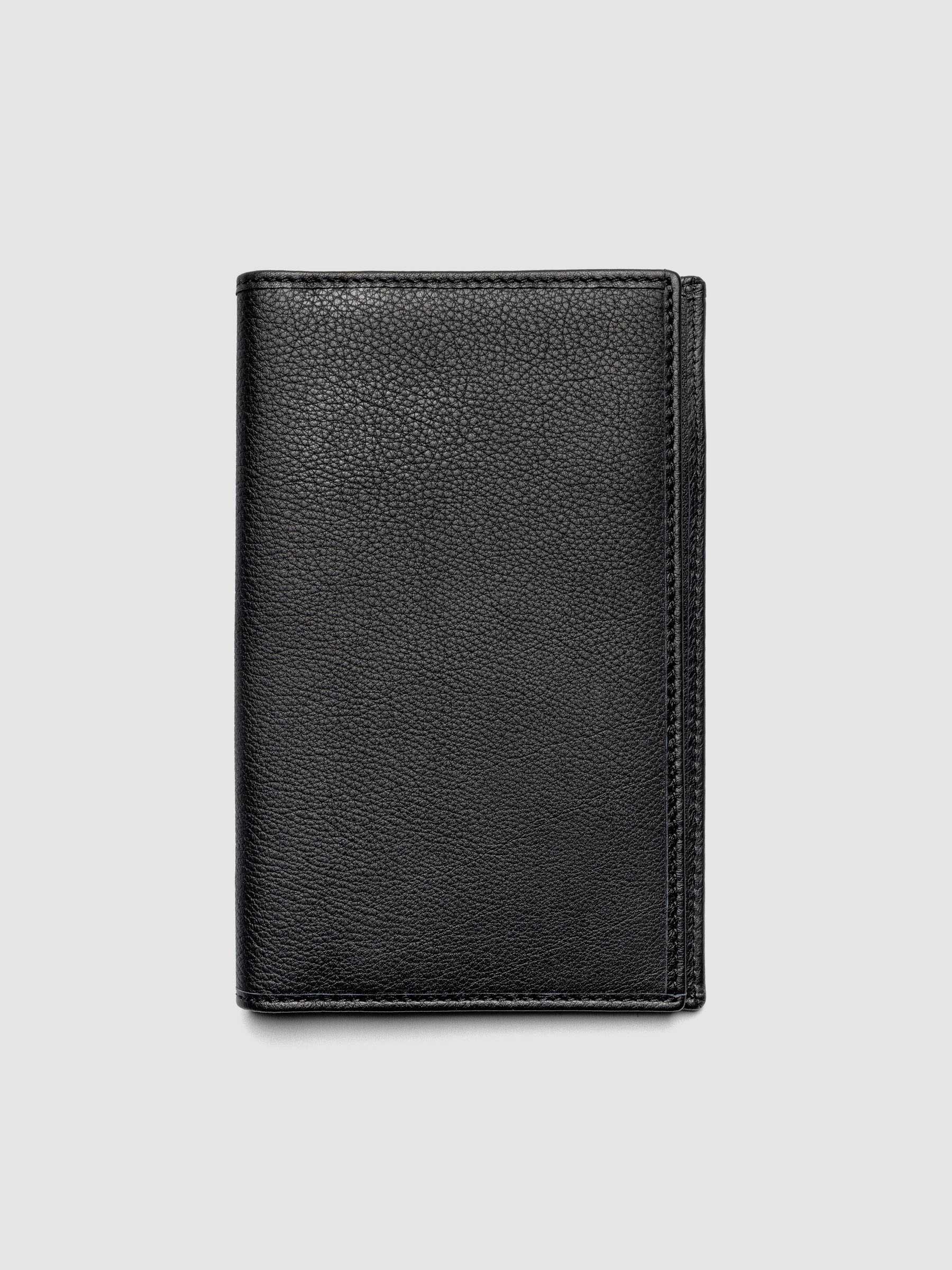 Nomada Wallet in Padrillo closed, showing black Spanish leather exterior