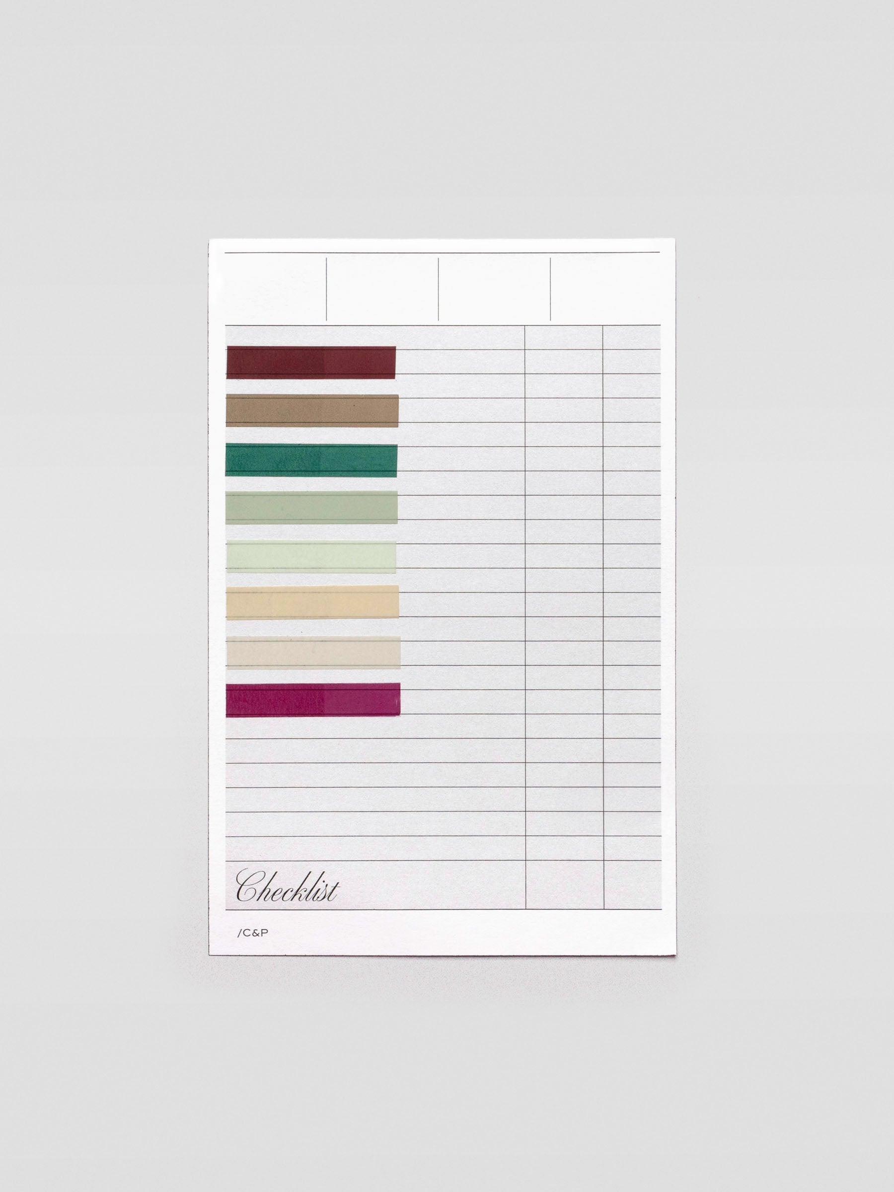 Short page pins in volume 2, a set of 8 page pin solid colors including brown, grey, greens, beige, and red shown individually on paper.