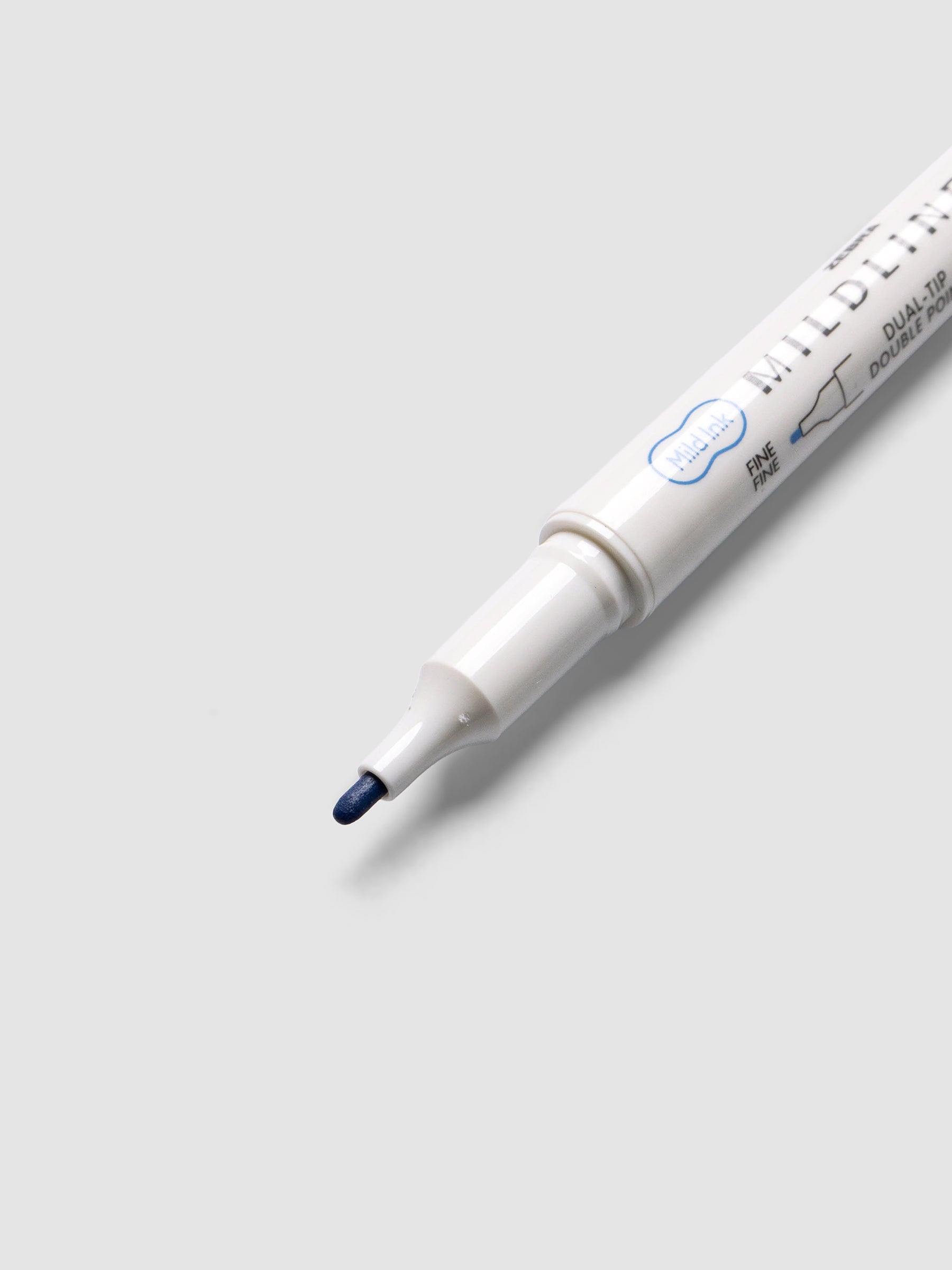 Close-up of Zebra Mildliner Dual-Tip Fineliner fine bullet tip in dark blue