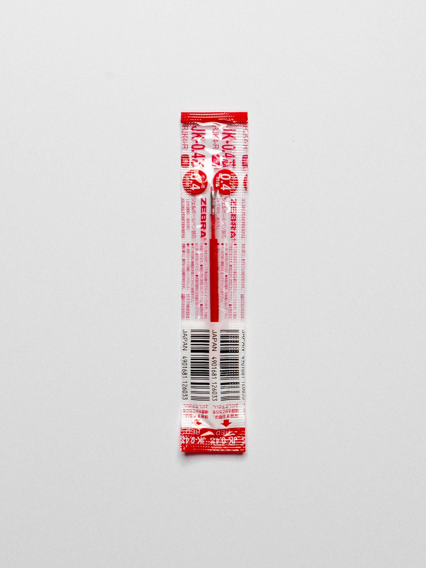 Red 0.4 mm refill shown on a neutral background.