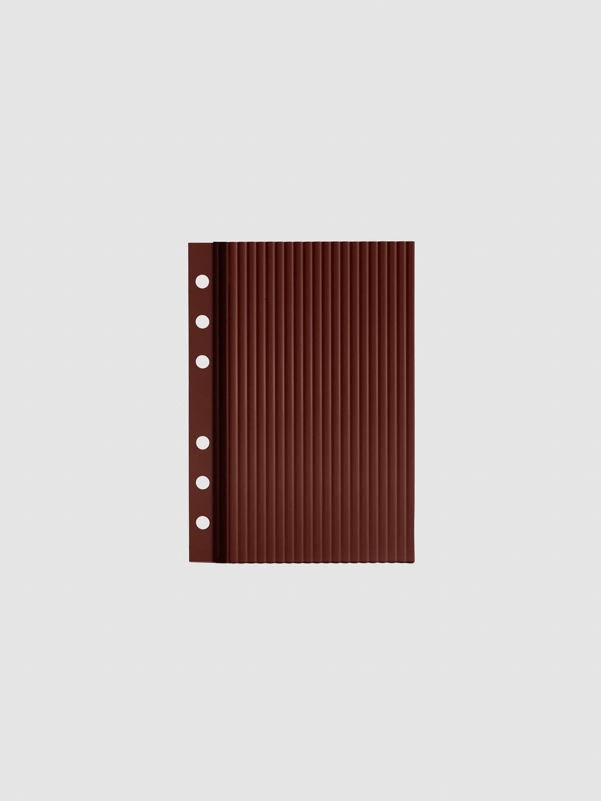 Bordeaux fluted planner dashboard in A6 size, six ring punch, shown flat on a grey background.