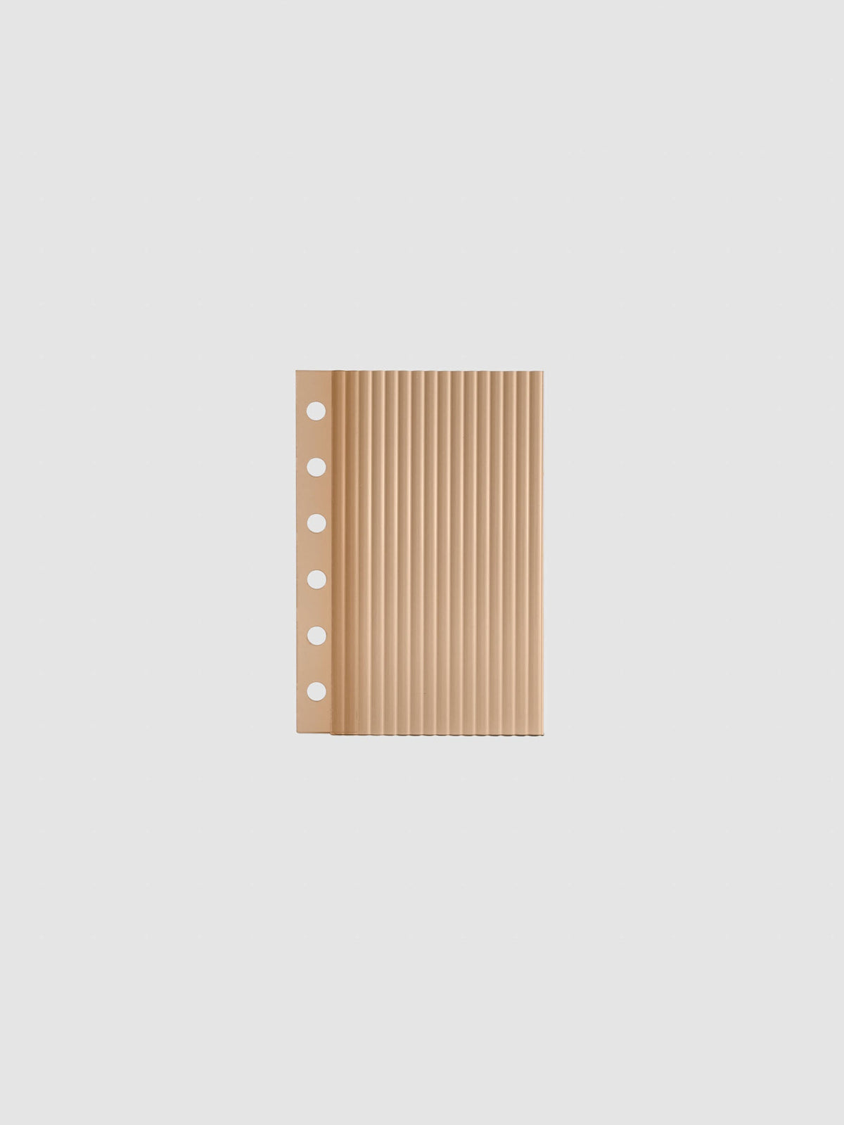Bisque fluted planner dashboard in Pocket size, six ring punch, shown flat on a grey background.