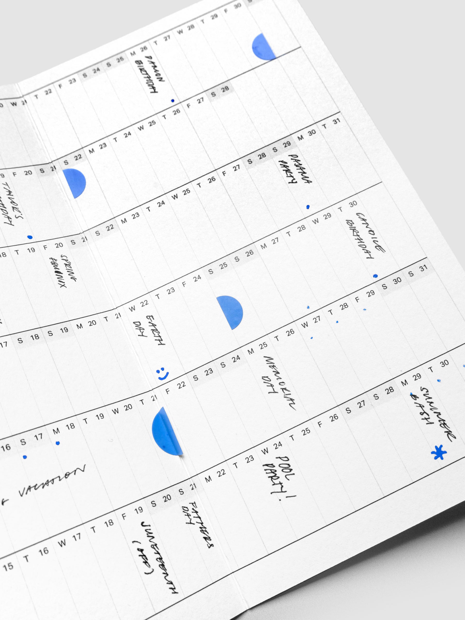Semicircle Sticker Set in Hyacinth blue in use on a planner insert.