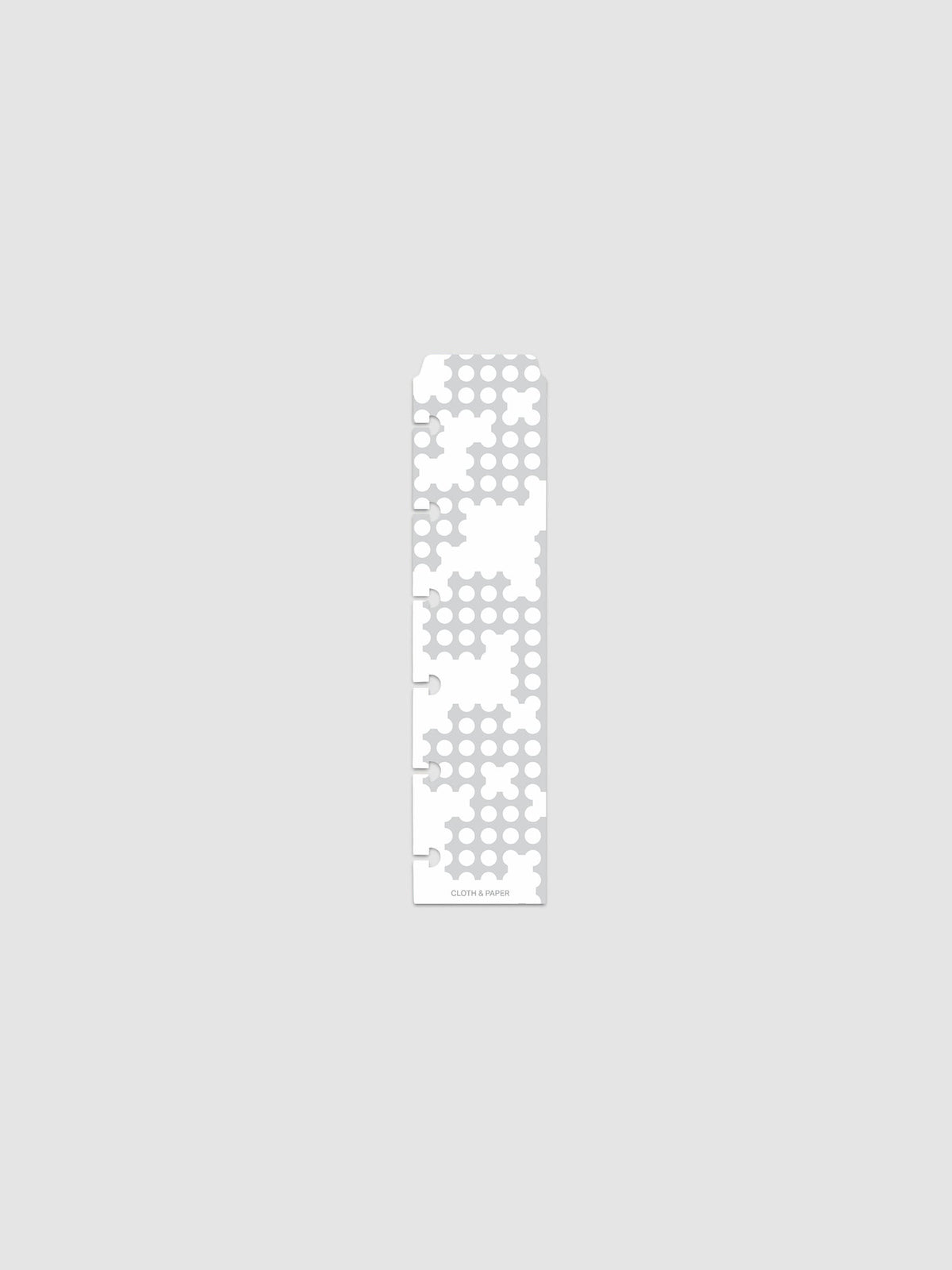 Narrow Page Marker Set in Punched Holes, Blurred Line and Avant Garde, CP Petite 6-Disc Punch, single Blurred Line marker