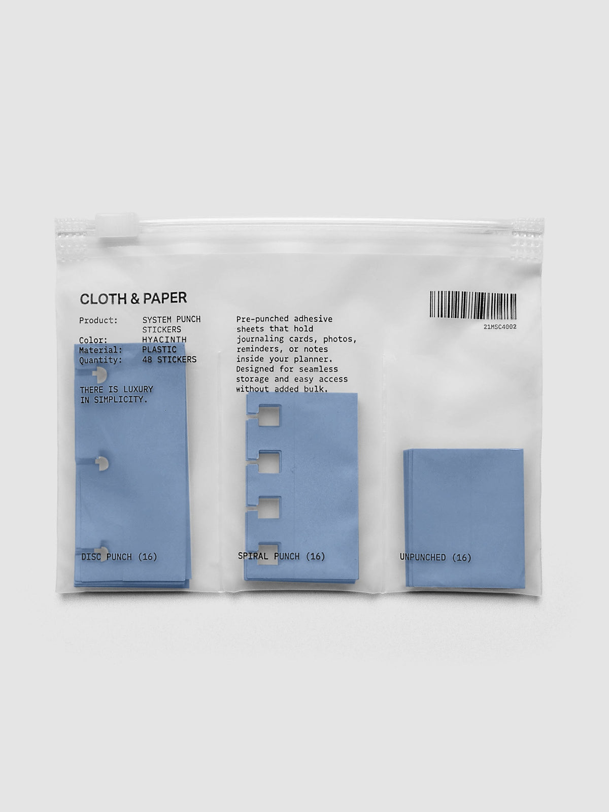 System Punch Stickers in Hyacinth, disc punch pack with disc punch, spiral punch and unpunched adhesive stickers in a zip bag