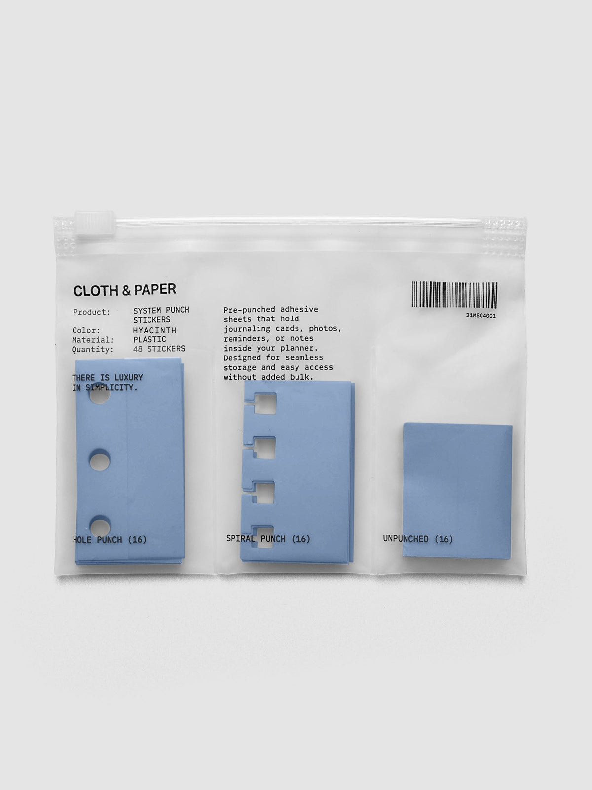 System Punch Stickers in Hyacinth, ring punch pack with hole punch, spiral punch and unpunched adhesive stickers in a zip bag