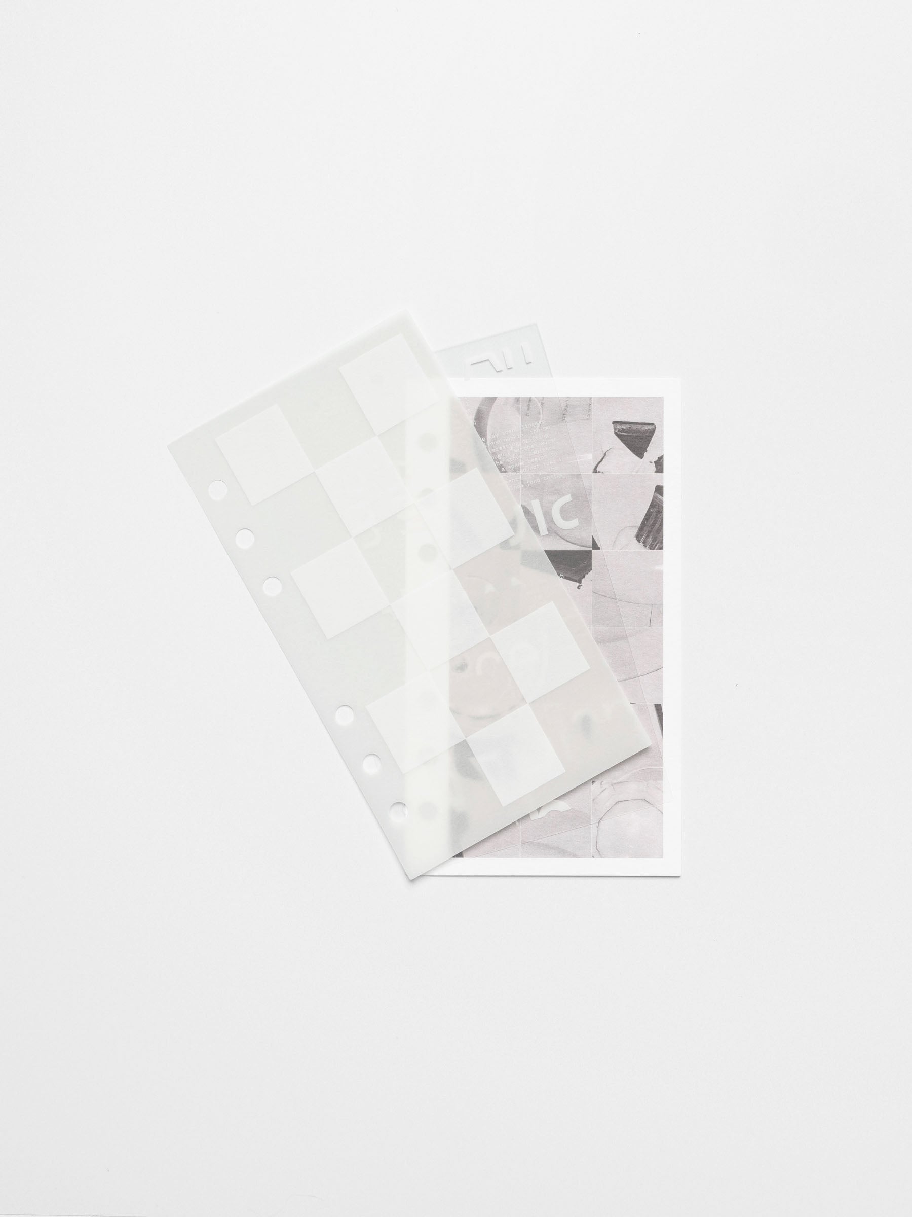 Ambiance Dashboard Trio in Personal size laid out on a white surface, featuring the translucent layers stacked over the printed dashboard card.