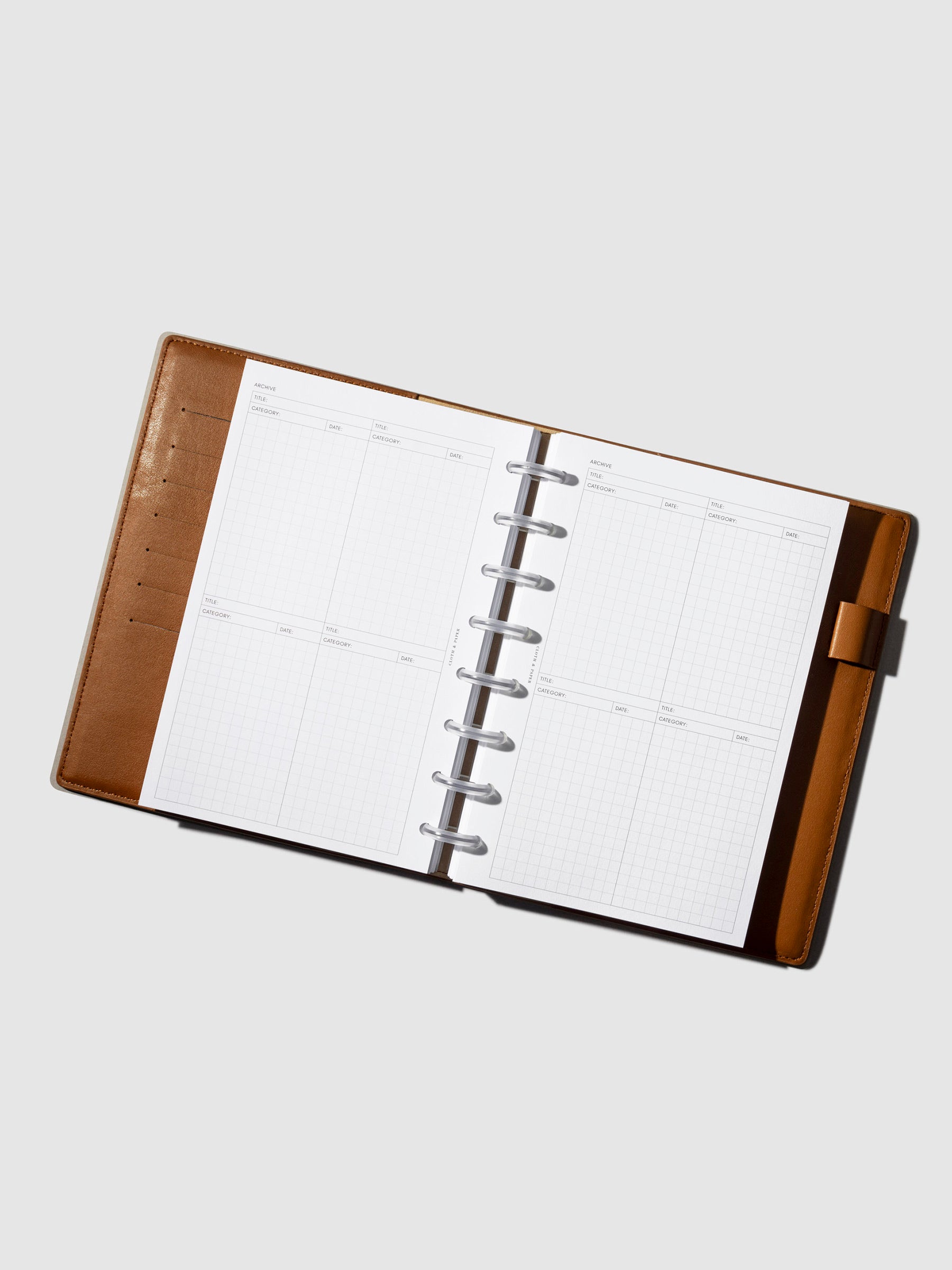 Inserts in use inside a leather planner.