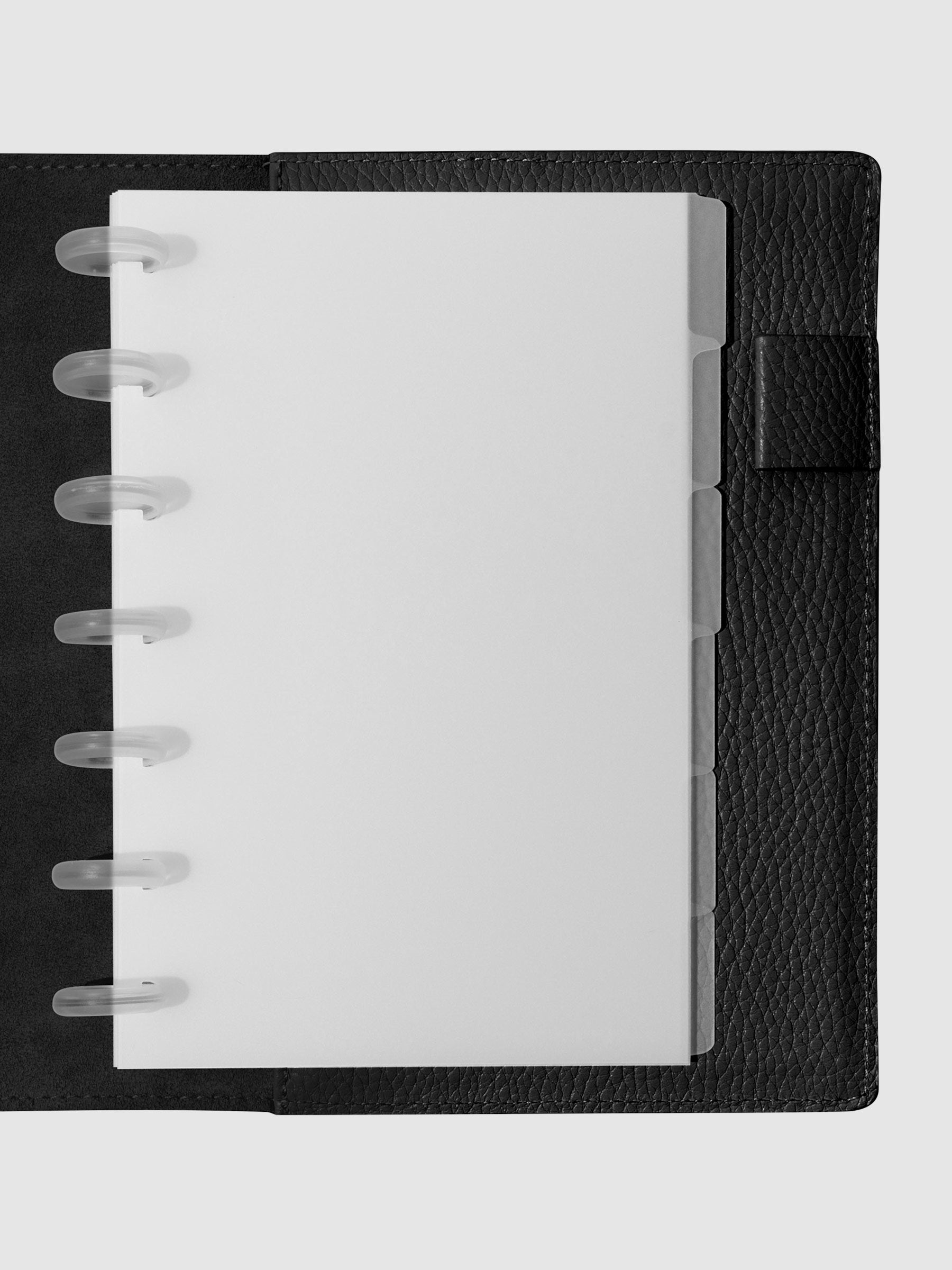 HP Mini Blank side tabs shown in use inside a black leather planner.