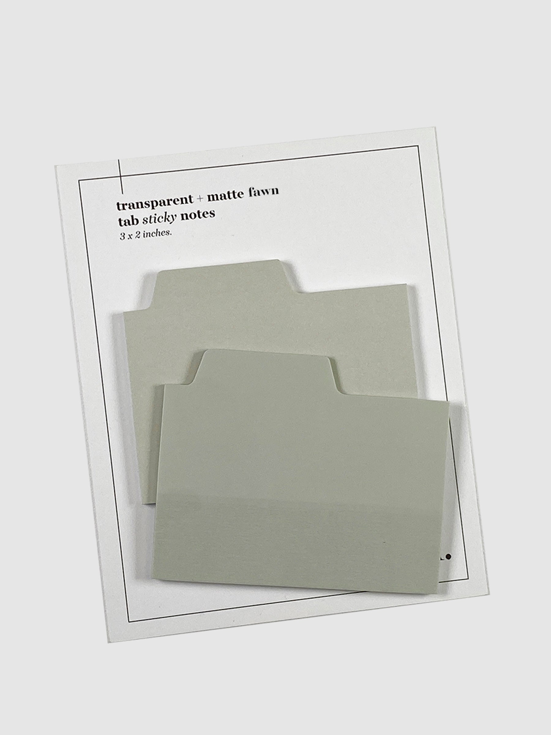 Blank Tab Sticky Note Set, Fawn, Cloth and Paper. Sticky note set displayed against a neutral background. The matte sticky note pad is attached to the sticky note backing, while the transparent sticky note pad is layered on top of it, turned slightly to the right.