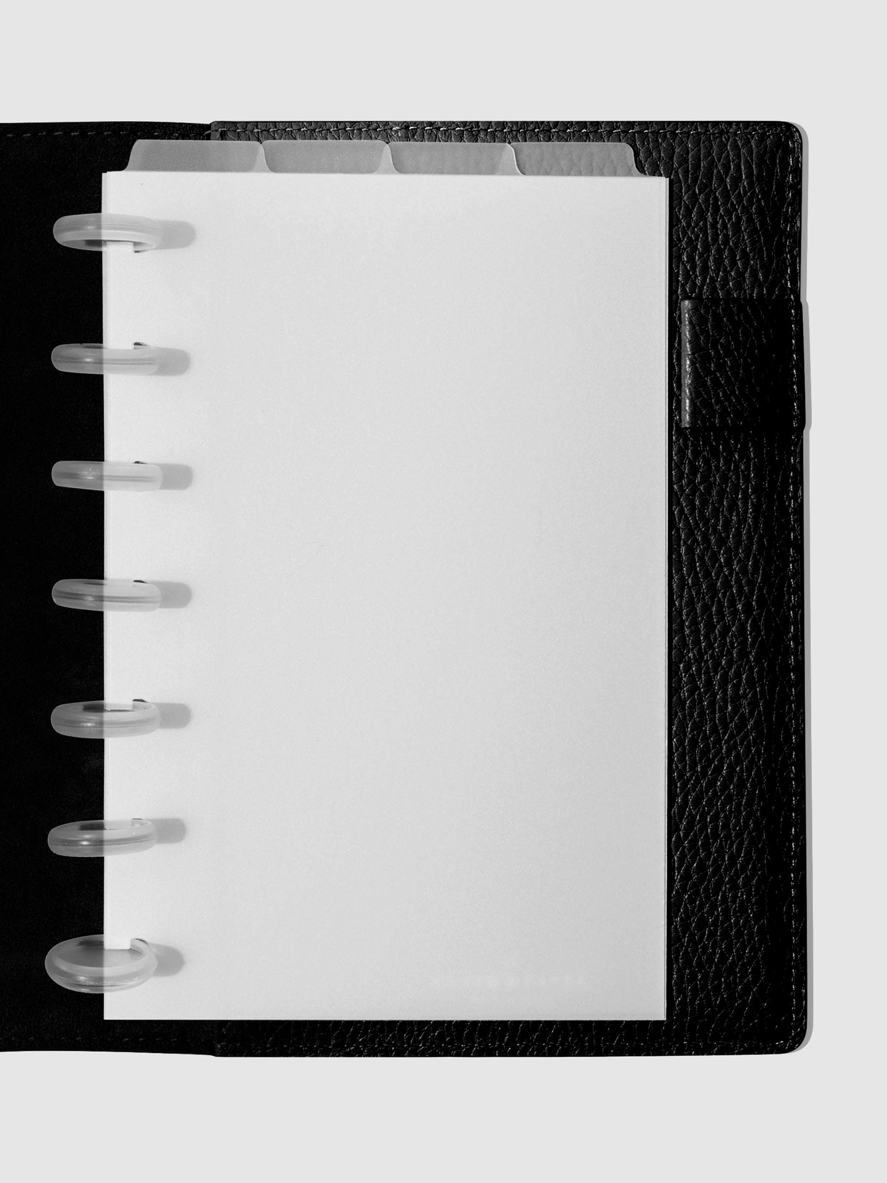 HP Mini Dividers in use inside a black leather planner.