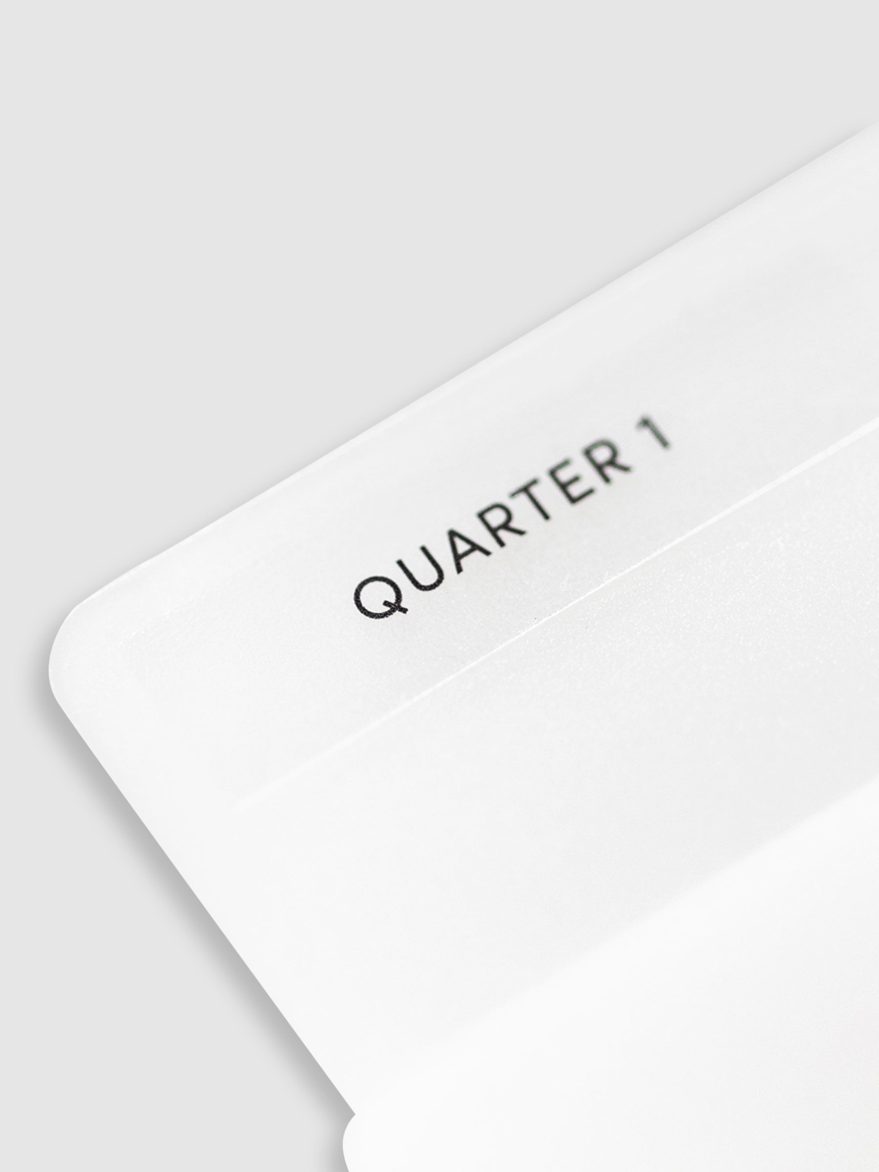 Close up of folder with label reading "Quarter 1."