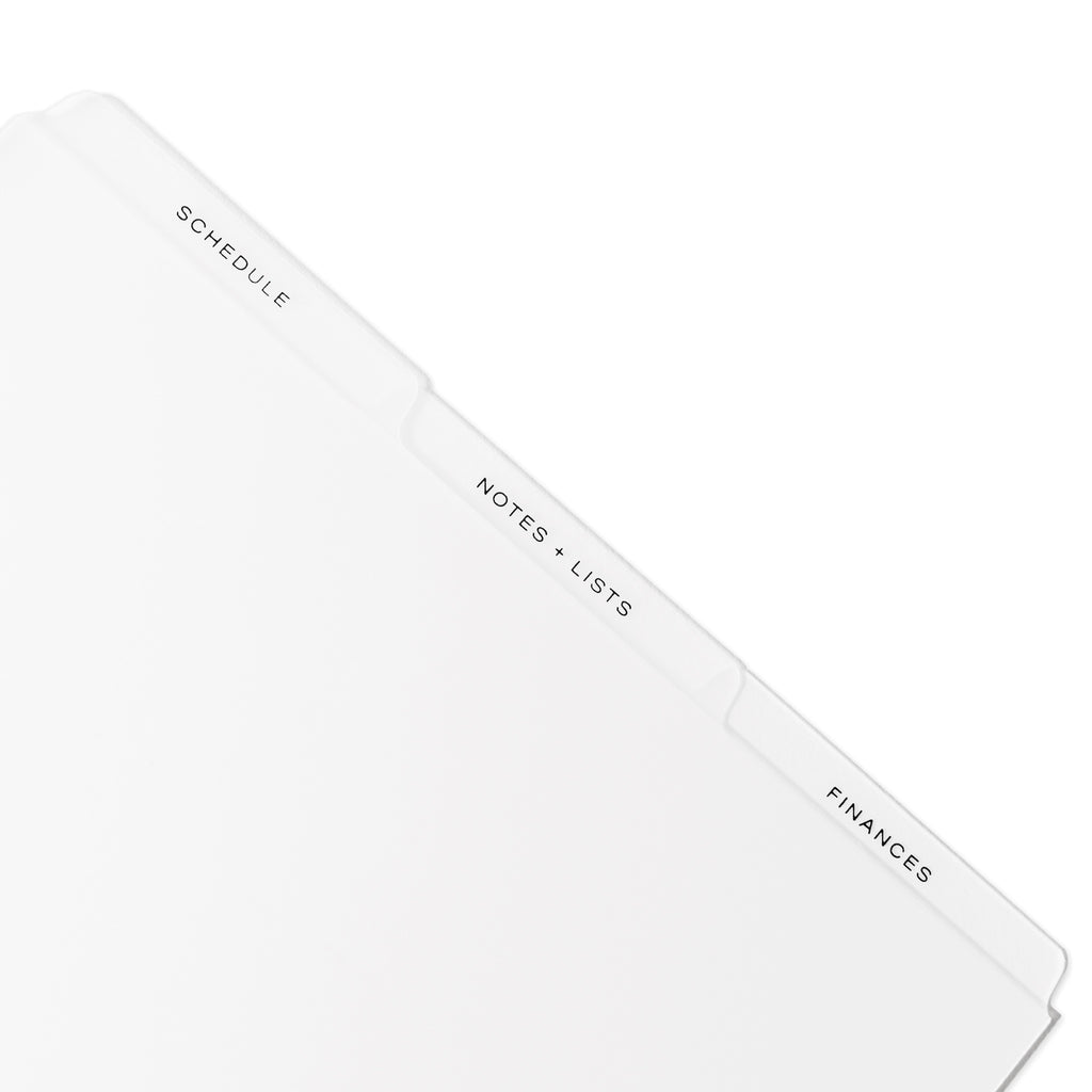Closeup of black tab dividers displayed on a white background.