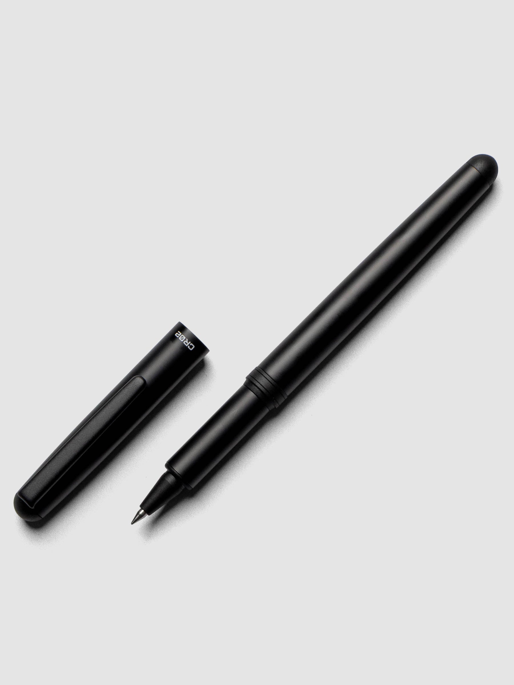 OHTO CR02 Ceramic Rollerball Pen | 0.5 mm shown in Black with cap off.