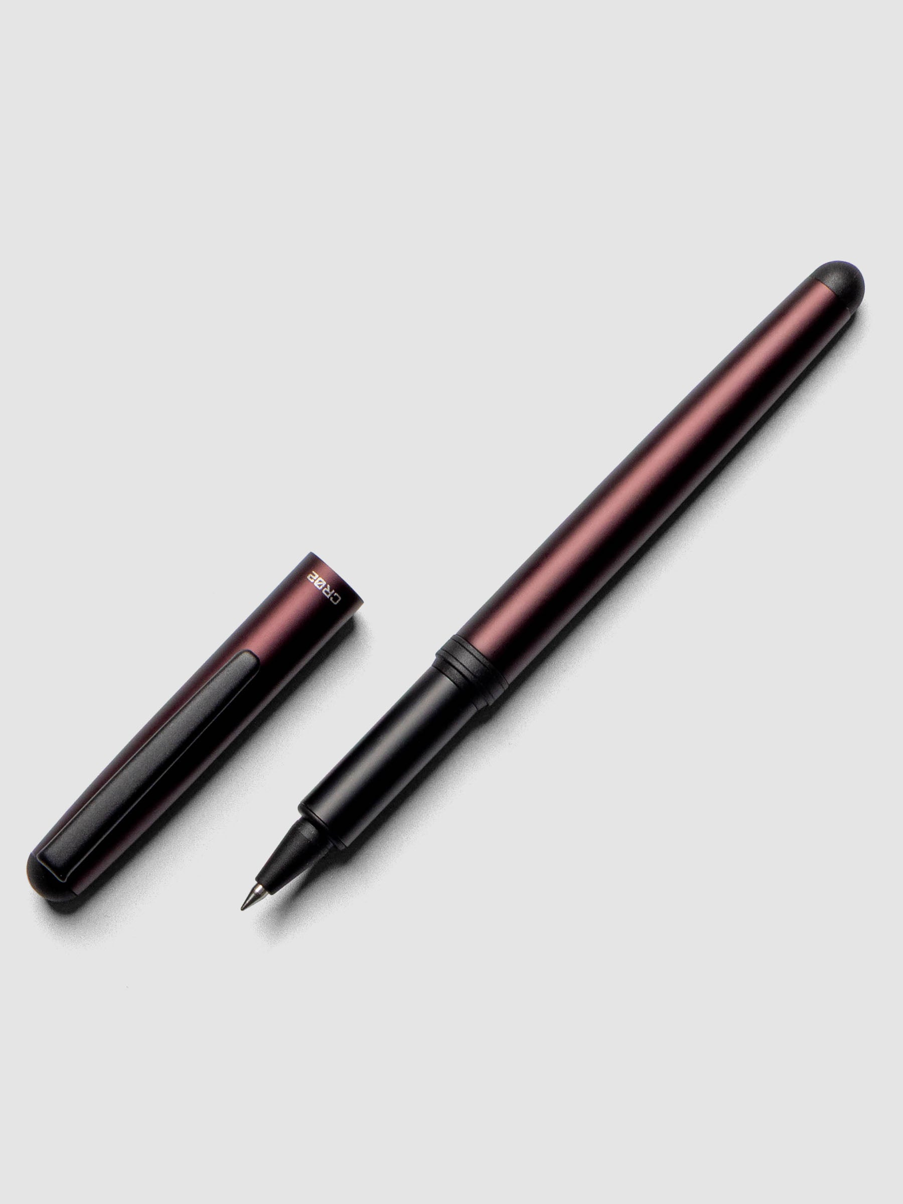OHTO CR02 Ceramic Rollerball Pen | 0.5 mm shown in matte wine with cap off.