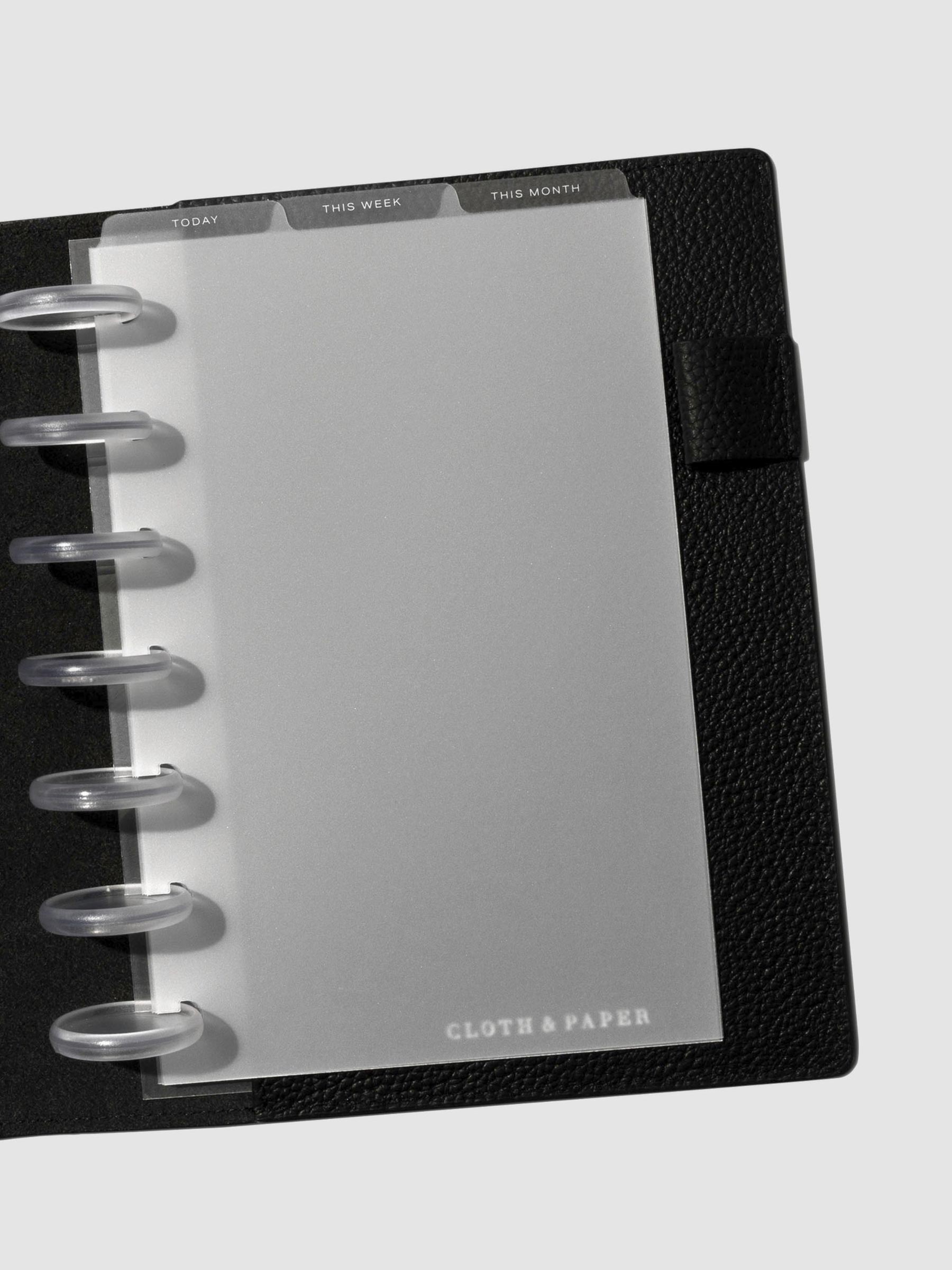 HP Mini White Foil Cadence Tab Dividers displayed in a black leather planner.