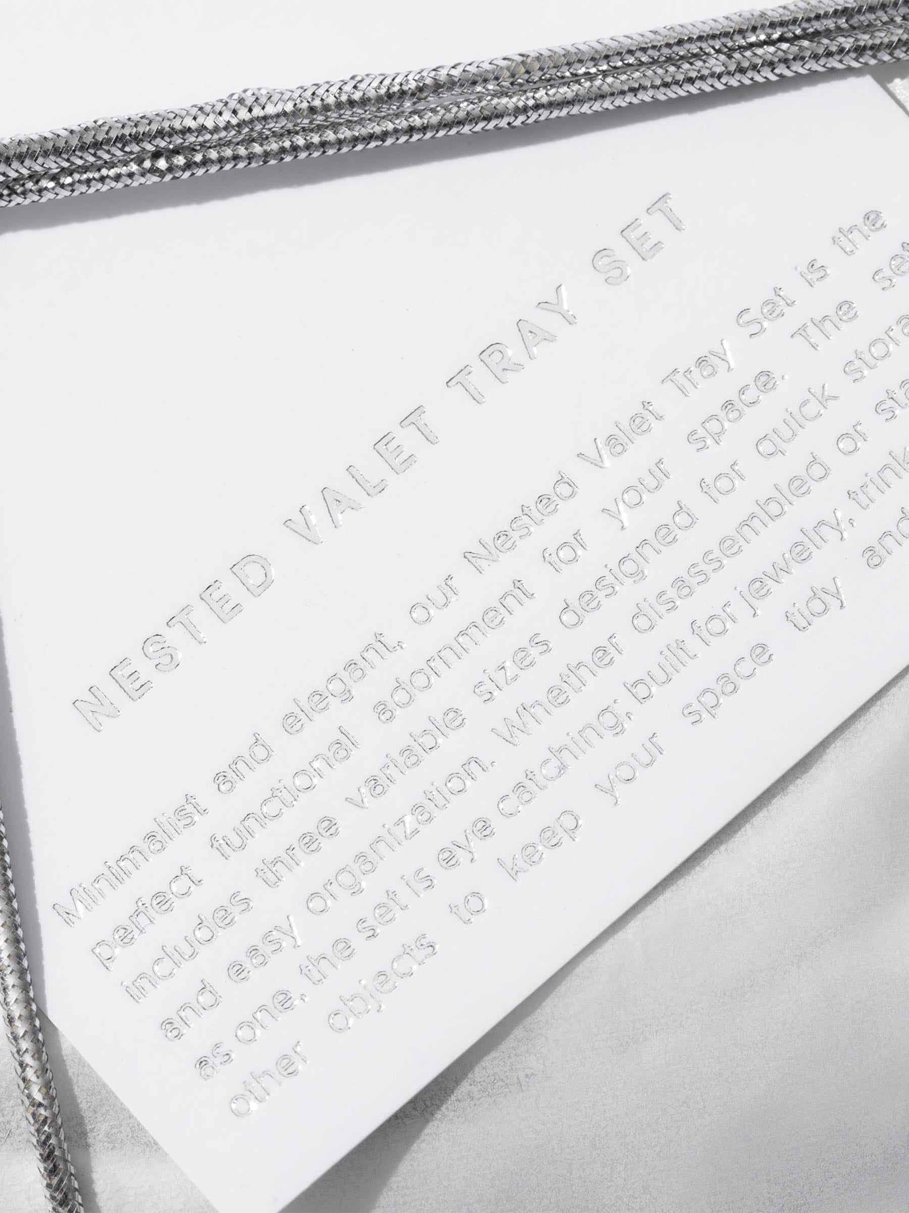 Closeup of the gift tag that comes with the set of trays.