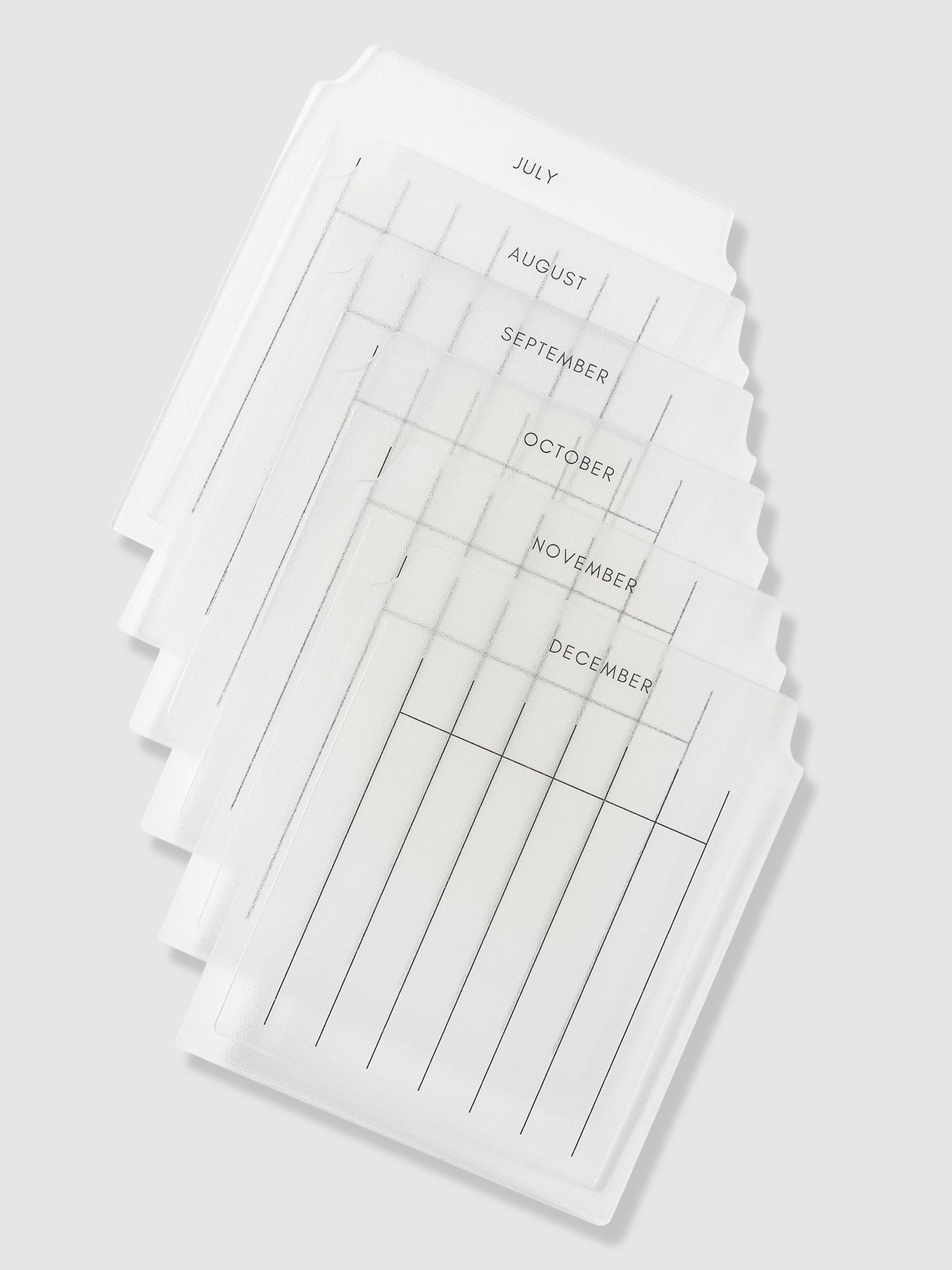 Set of 6 monthly index tabs displayed on a neutral background. Style is monthly, tabs shown are July through December.