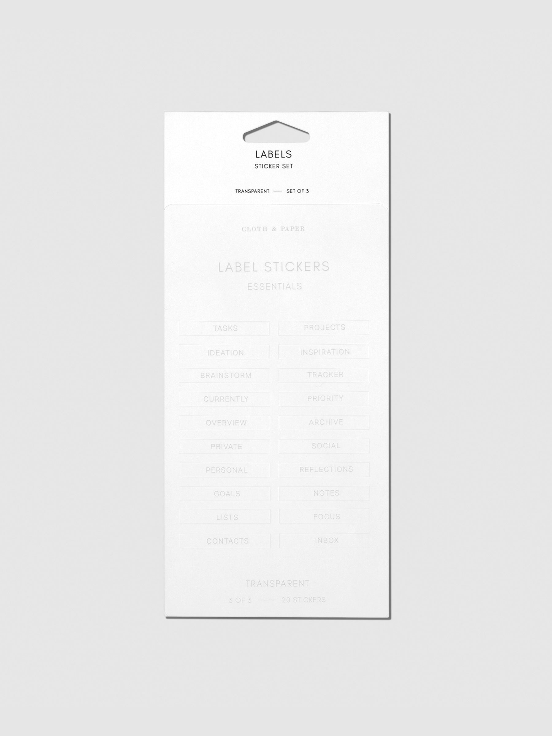 Label stickers in their packaging. The text on each sticker is silver.