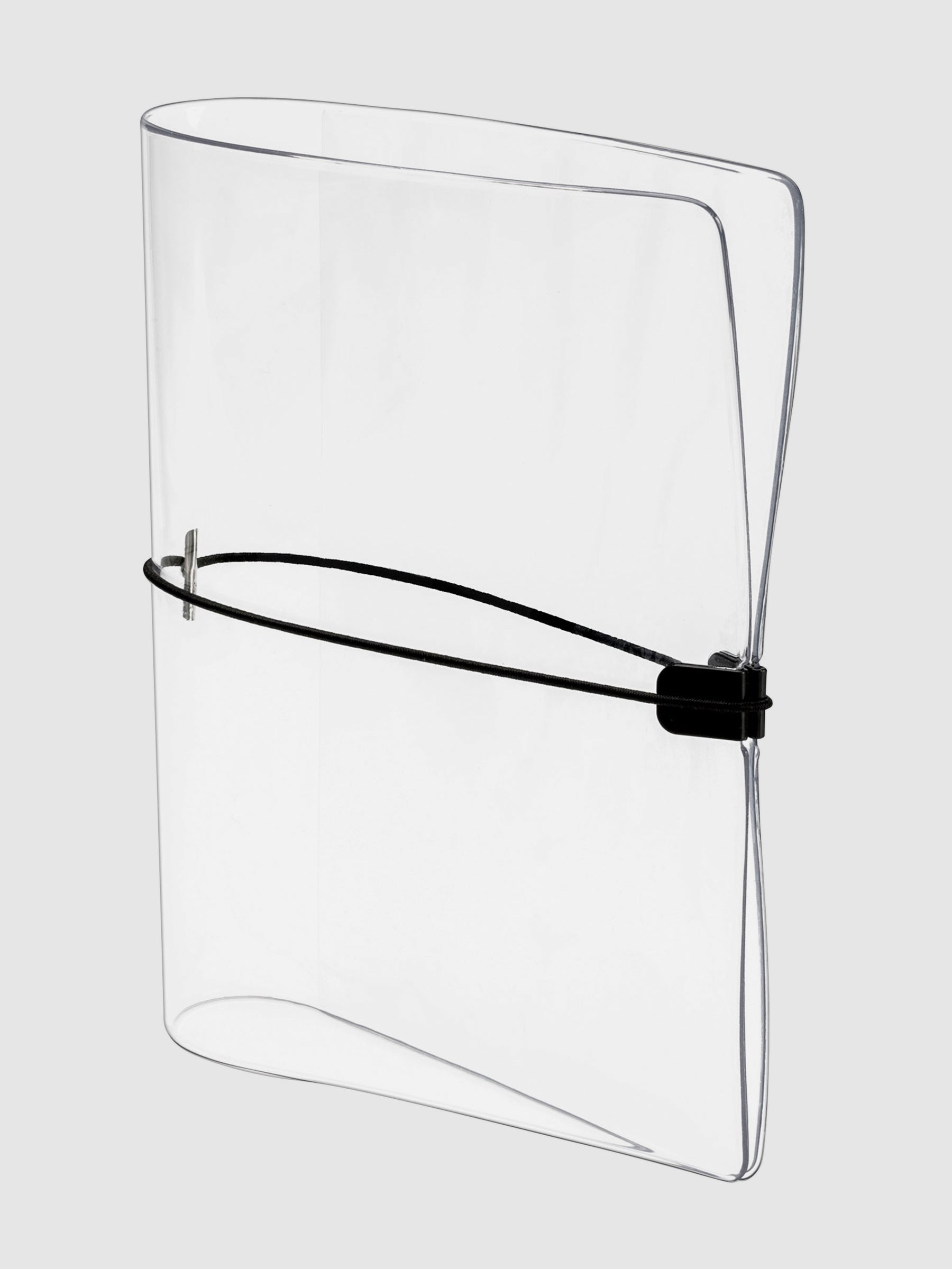 Clear vinyl cover stood up on a neutral background.