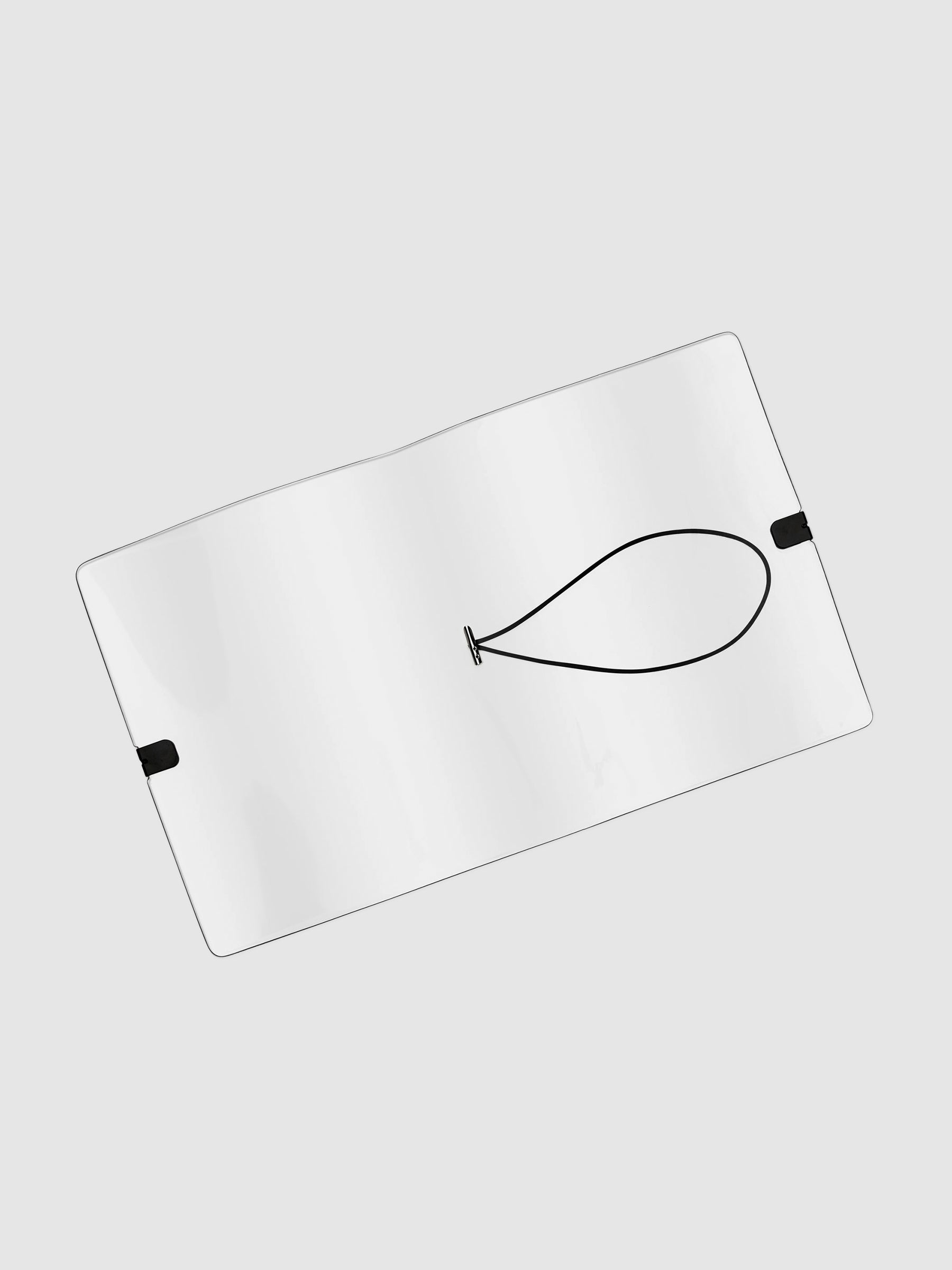 Clear vinyl cover opened and empty displayed on a neutral background.