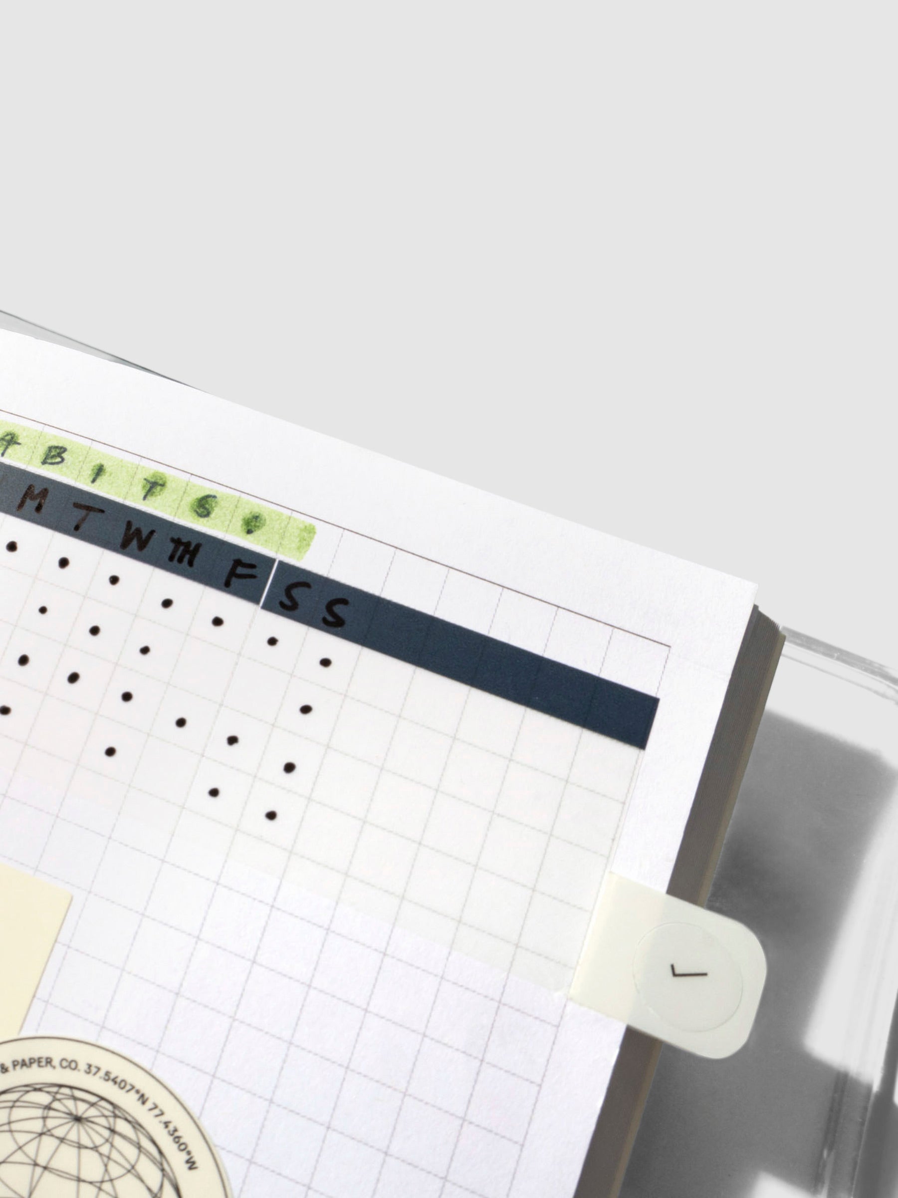 Closeup of notebook in use inside the clear vinyl cover.