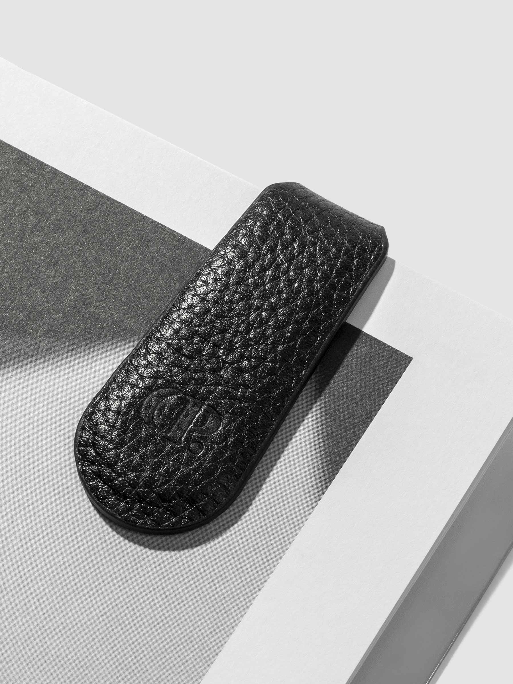 Close up of smooth leather texture on clip. Color shown is black.